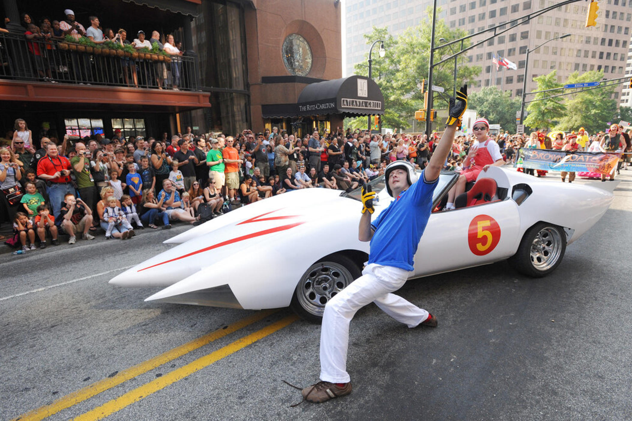 A man depicting Speed Racer strikes a pose while participating in the Dragon*Con parade to begin on Saturday, Sept. 3, 2011 in Atlanta.