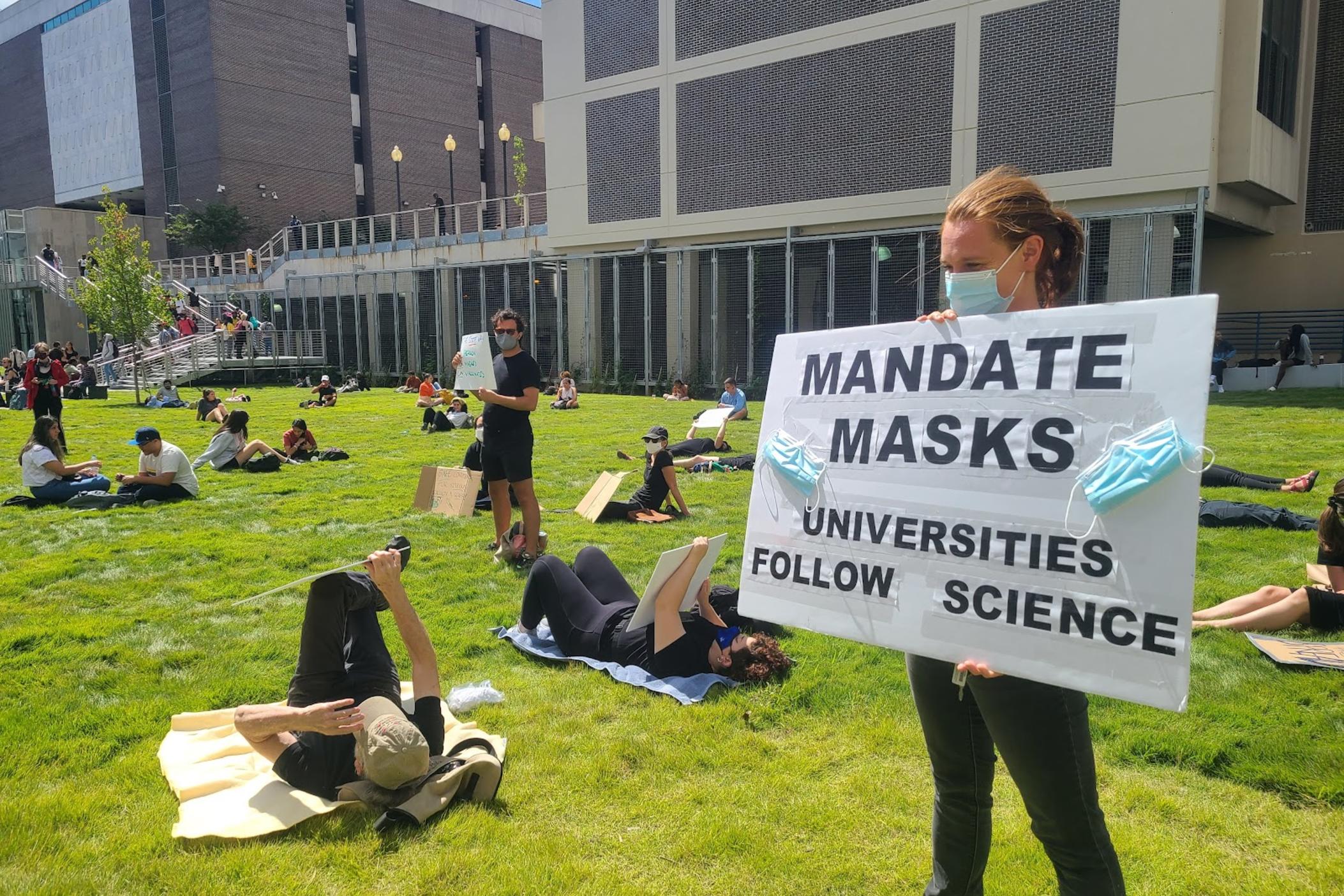 Protesters at Georgia State University participate in a September 2021 "die-in" demanding more safety measures on campus.