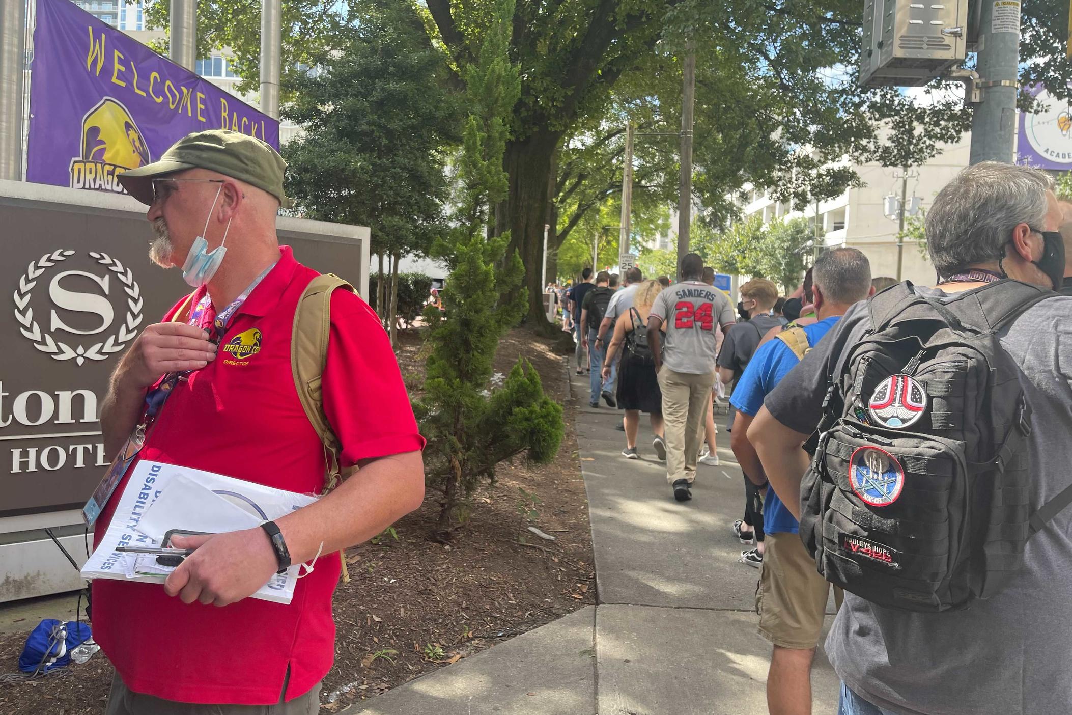 Attendees line up for registration Thursday at Dragon Con 2021. Close to 50-thousand people are expected to converge on downtown this weekend, but the annual pop culture event will include a caveat – attendees will have to present either a negative COVID-19 test or proof of vaccination.