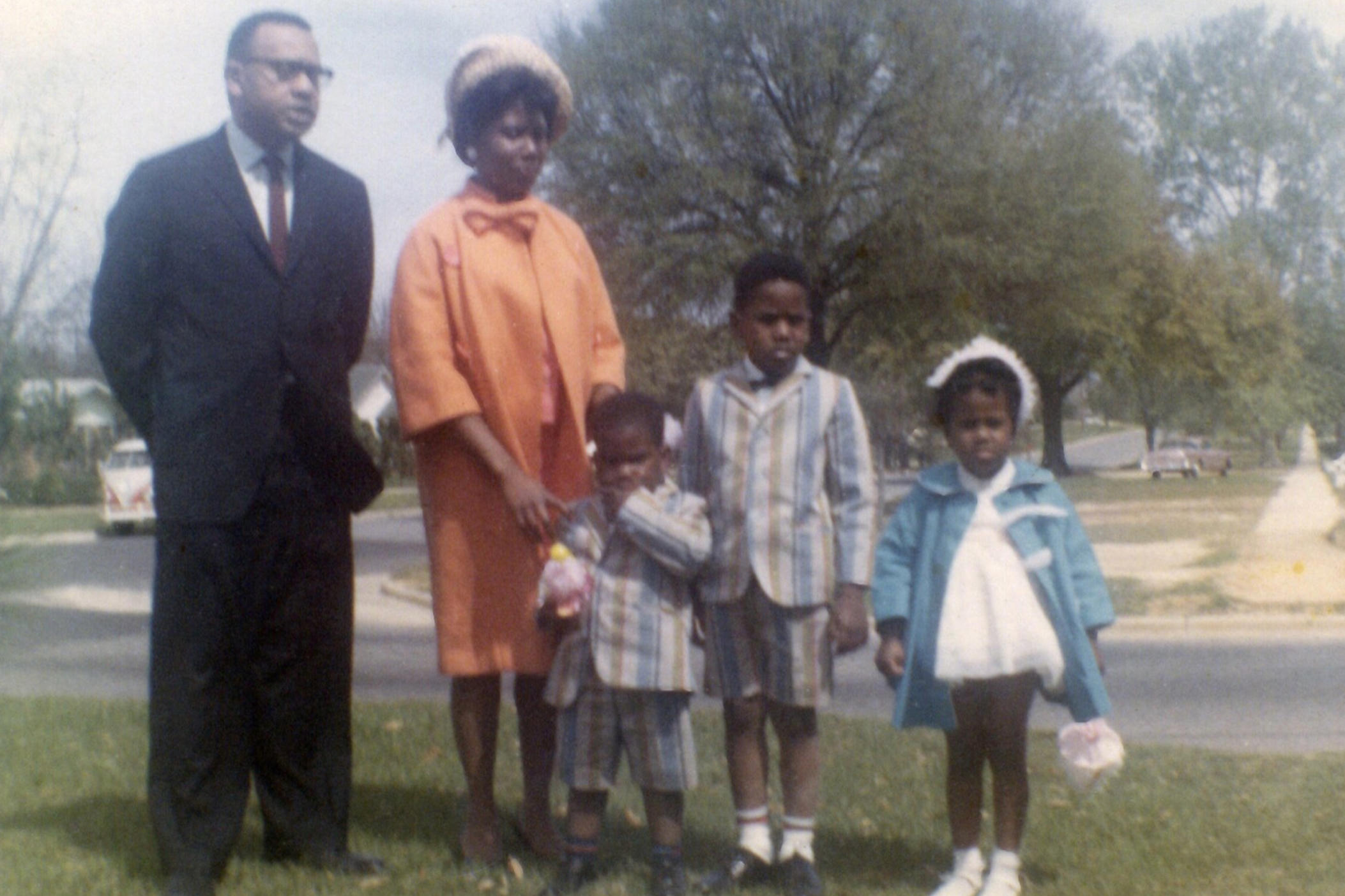 Mrs. King stands with her husband, Slater King and their three children who witnessed the police assault. 