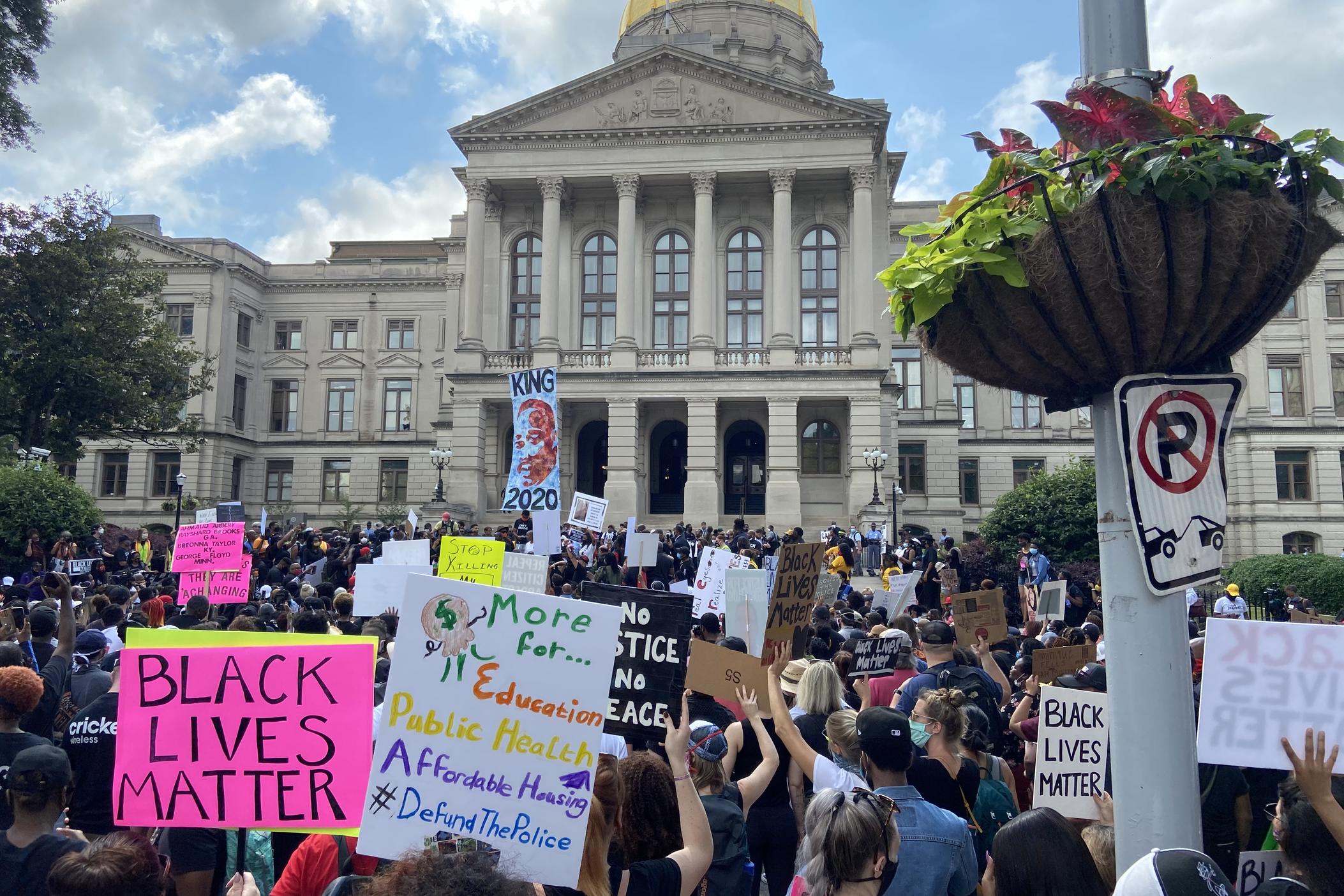 'March On Georgia' rally demonstrators head towards the Georgia State Capitol on June 15, 2020.