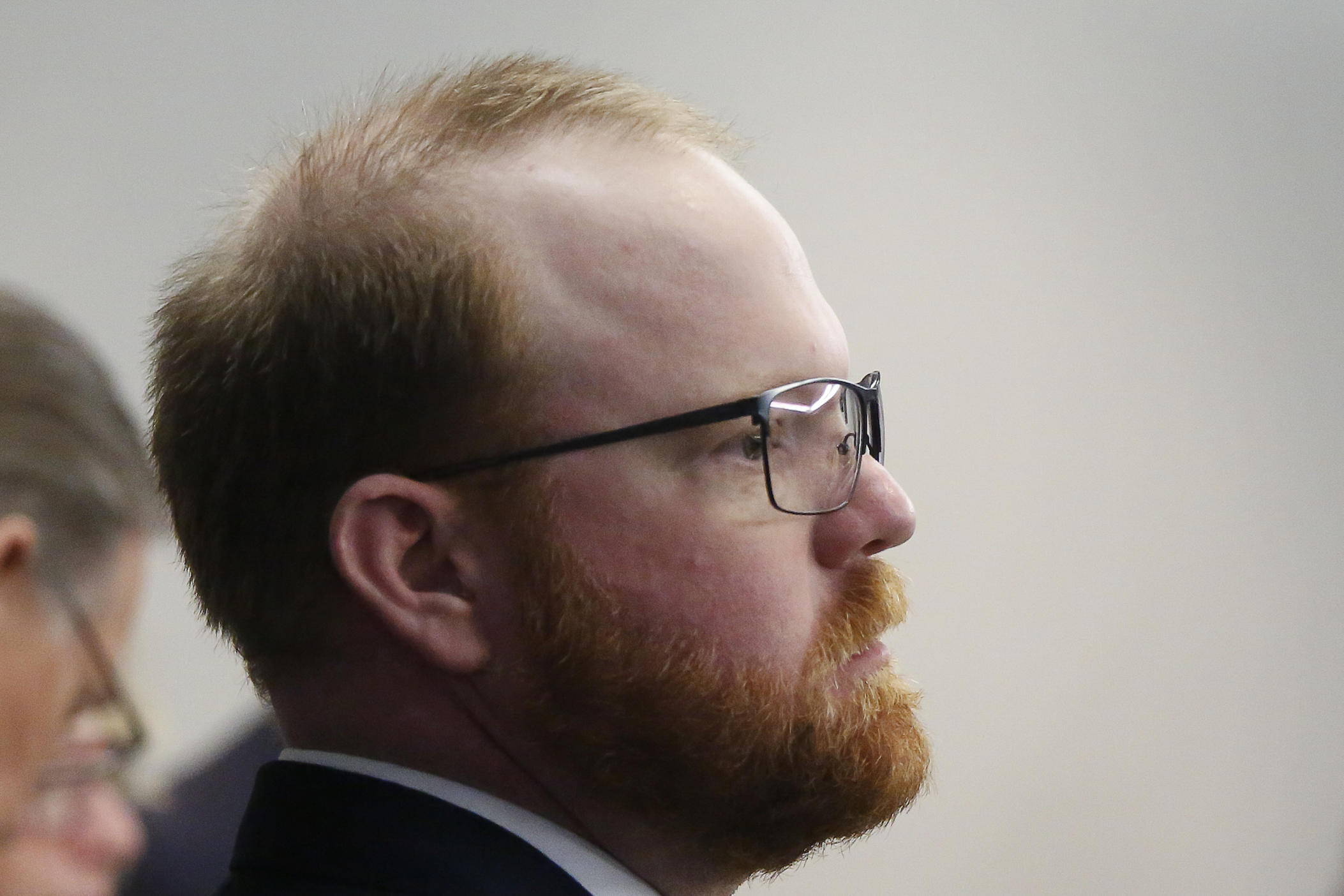 Defendant Travis McMichael looks on during his trial with William "Roddie" Bryan, and Gregory McMichael, all charged with the February 2020 death of 25-year-old Ahmaud Arbery, Tuesday, Nov. 23, 2021, at the Glynn County Courthouse in Brunswick, Ga. 