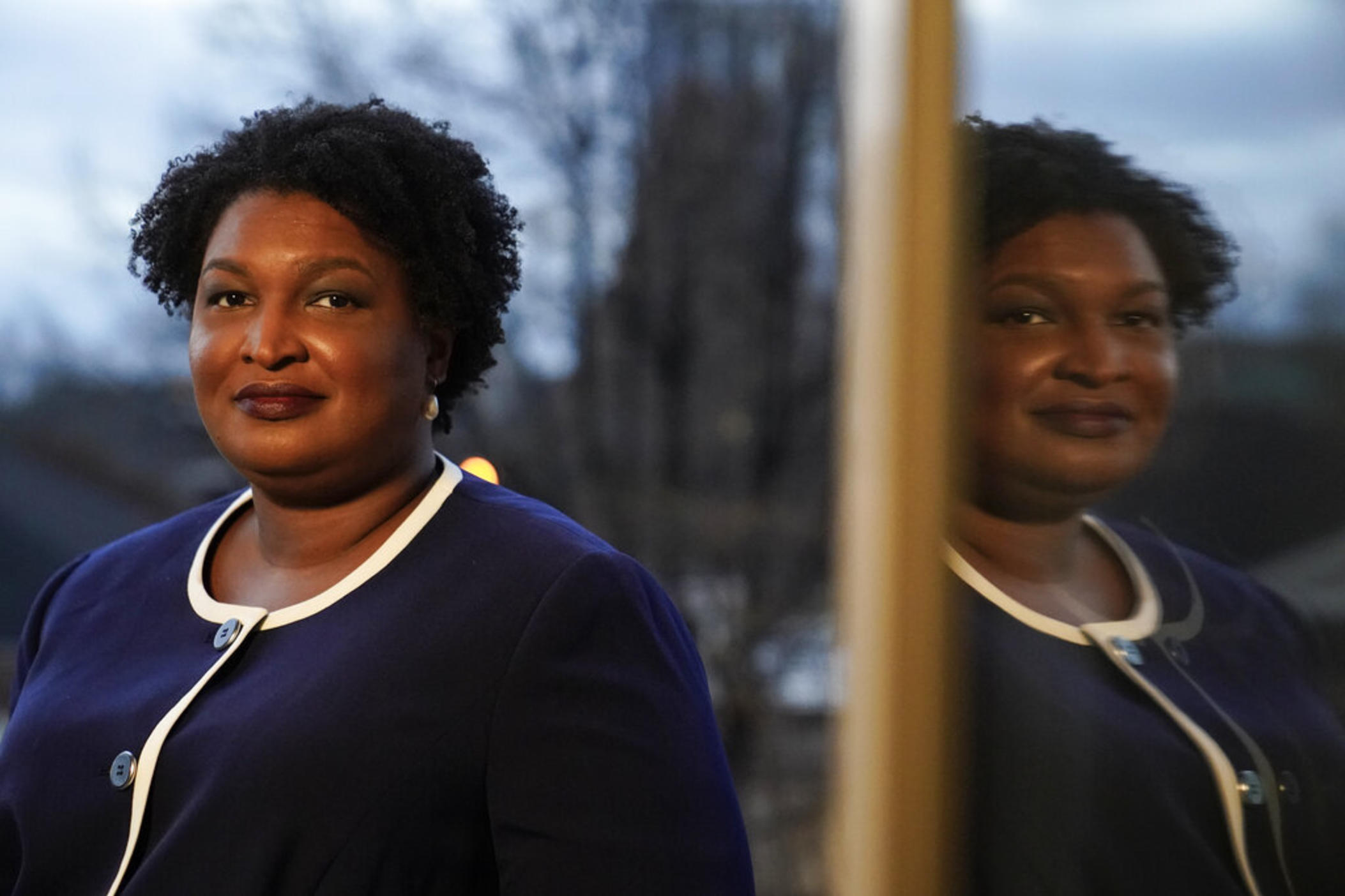 Georgia gubernatorial Democratic candidate Stacey Abrams poses for a photo during an interview with The Associated Press on Thursday, Dec. 16, 2021, in Decatur, Ga. Abrams is calling on Congress to act on voting rights as the Democrat launches a second bid to become her state's governor.