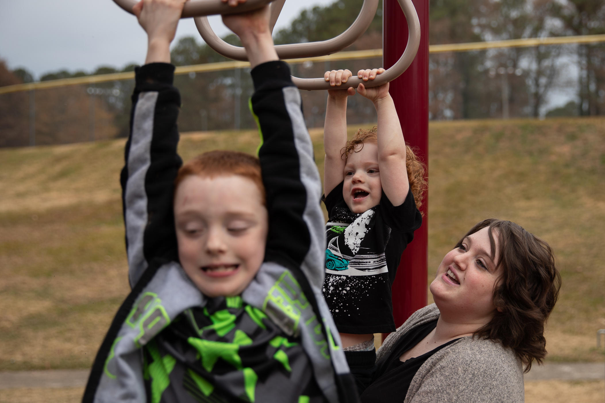 Hannah Ochoa plays with her children in Marietta