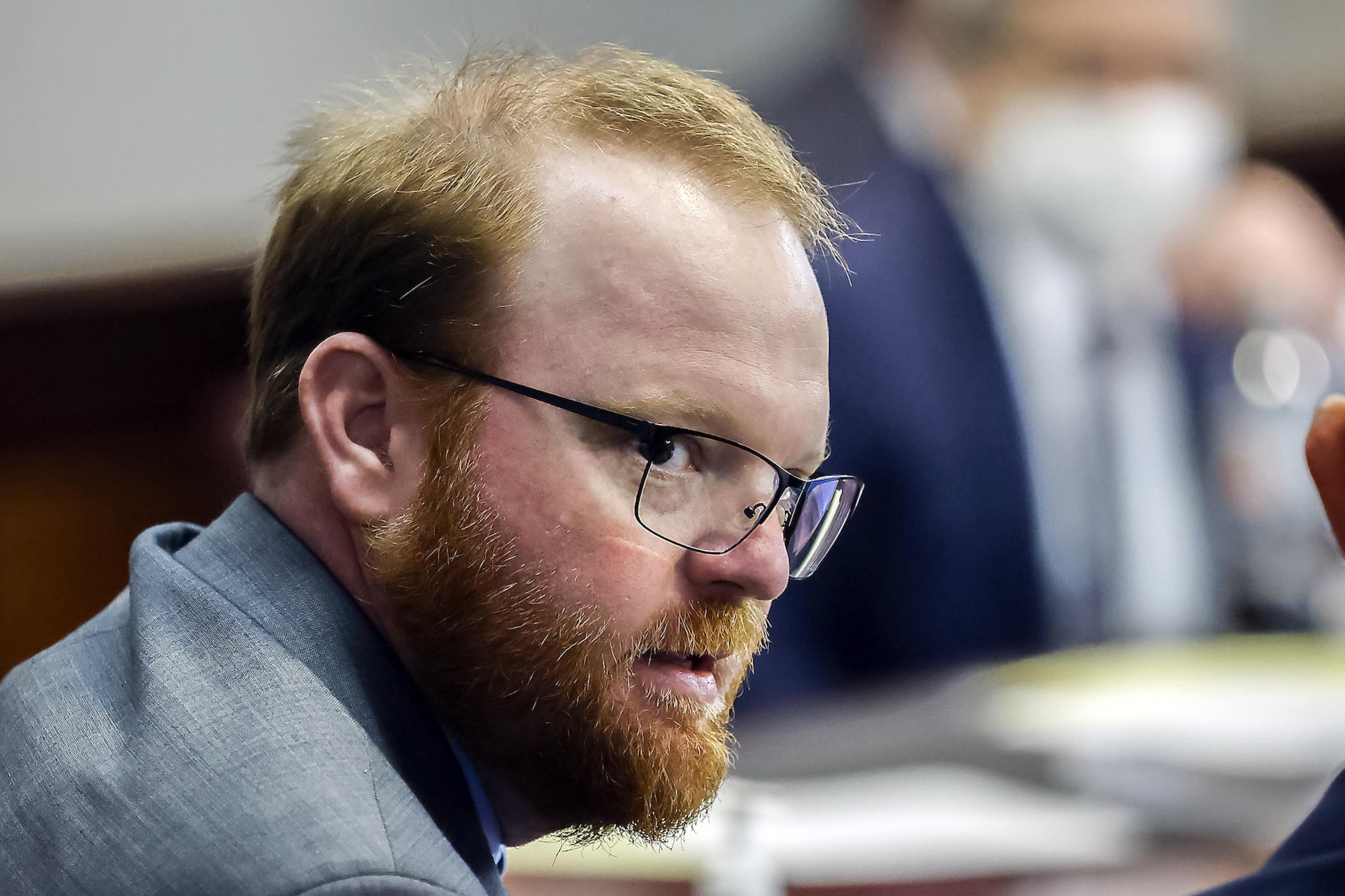 Travis McMichael, left, speaks with his attorney Jason B. Sheffield during the sentencing of he and his father Greg McMichael and neighbor, William "Roddie" Bryan in the Glynn County Courthouse, Friday, Dec. 7, 2022, in Brunswick, Ga. The three found guilty in the February 2020 slaying of 25-year-old Ahmaud Arbery.