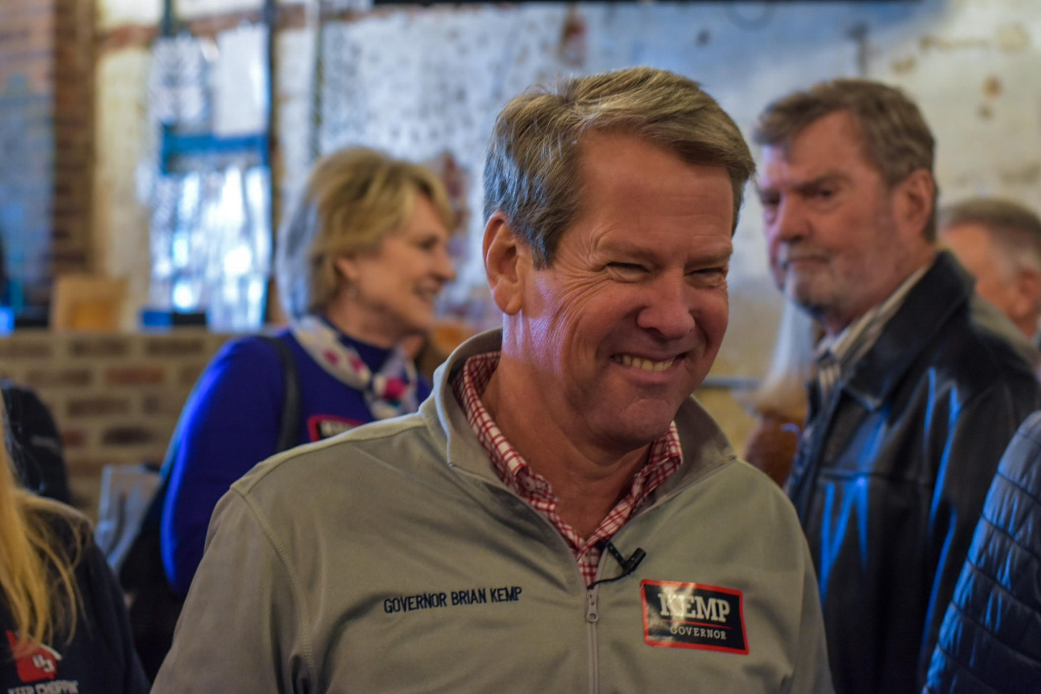 Gov. Brian Kemp smiles at a campaign stop in northeast Georgia Friday, Feb. 18, 2022.