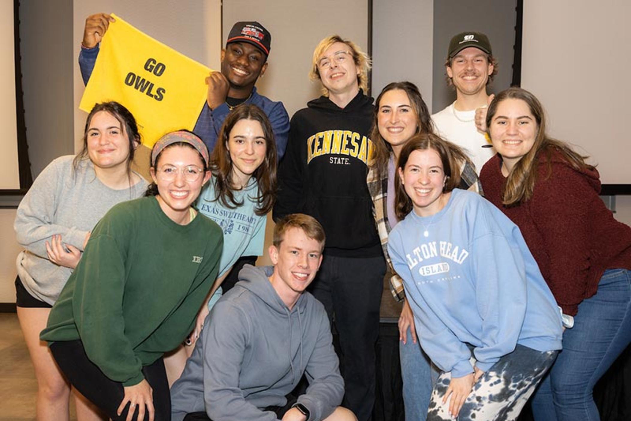 Lines formed at the start of the celebration on the Kennesaw campus, full of students, faculty and staff waiting to meet and congratulate Raymond Goslow (center, in Kennesaw shirt), no matter the outcome of his "Jeopardy!" National College Championship finals performance.