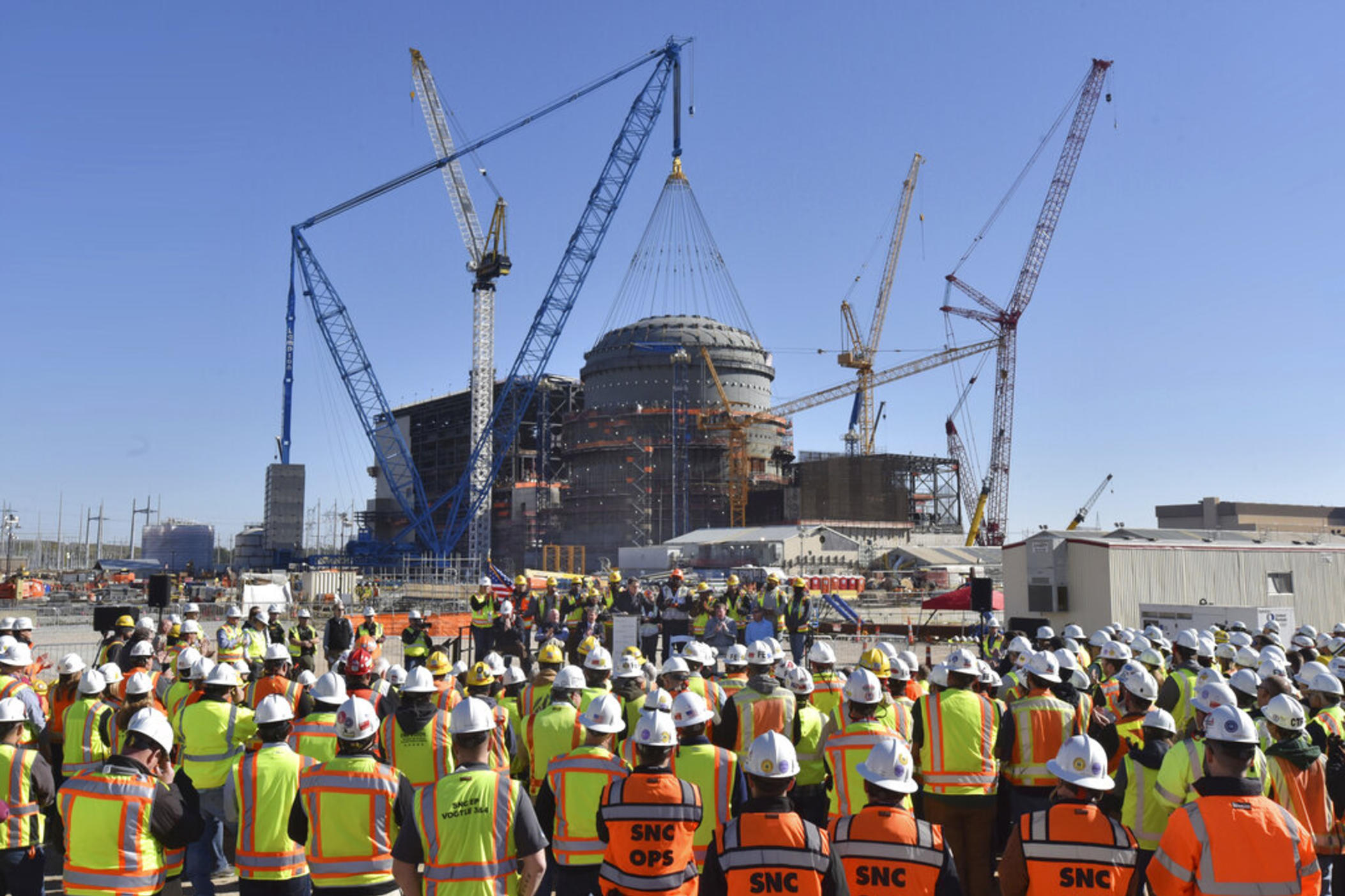 U.S. Secretary of Energy Rick Perry speaks during a press event at the construction site of Vogtle Units 3 and 4 at the Alvin W. Vogtle Electric Generating Plant, Friday, March 22, 2019 in Waynesboro, Ga. Georgia Power Co.’s parent company announced more cost overruns and schedule delays to the project in 2022. 