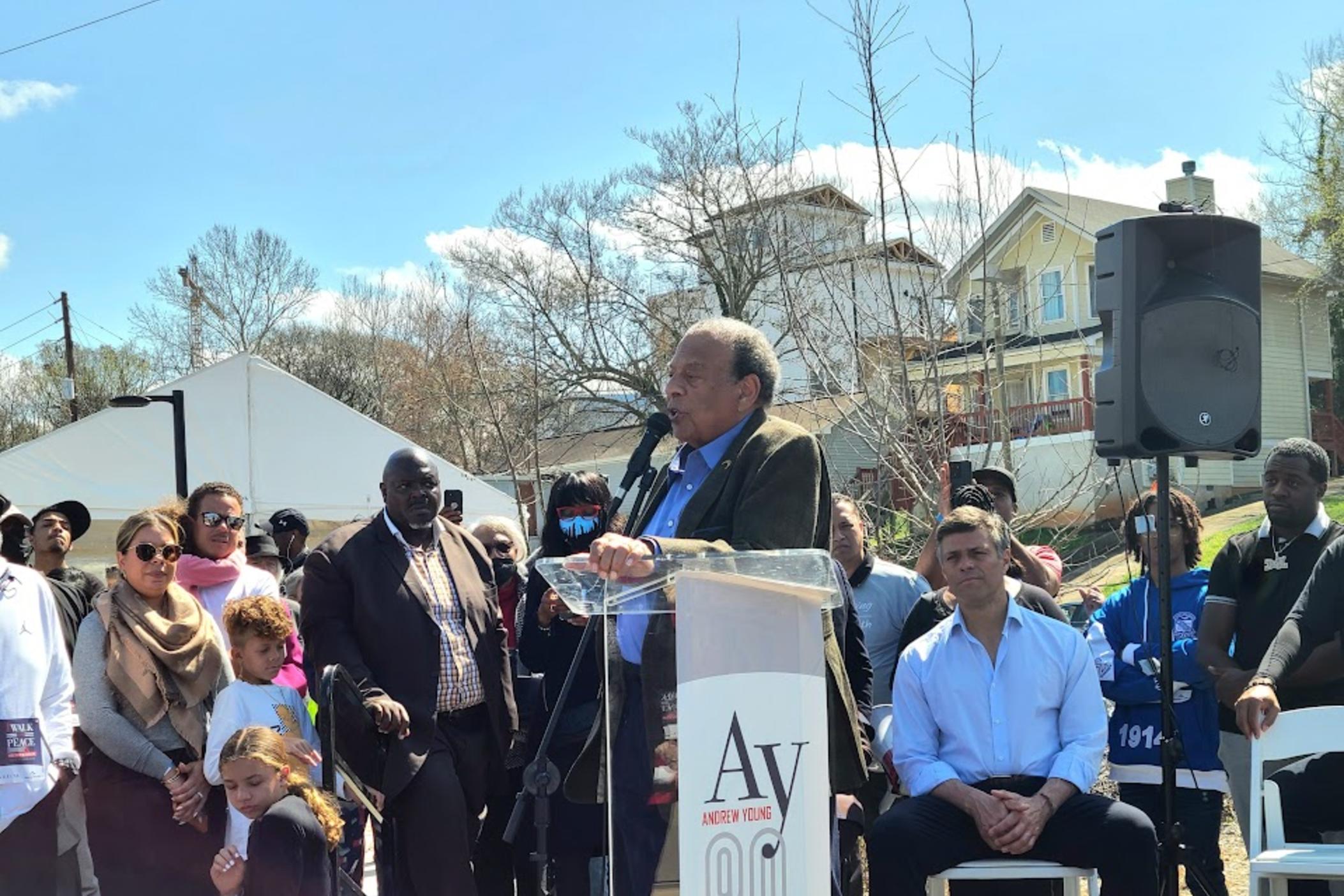 Georgia Ambassador Andrew Young speaks at a statue unveiling on March 10, 2022 following the Peace Walk honoring his upcoming 90th birthday. 