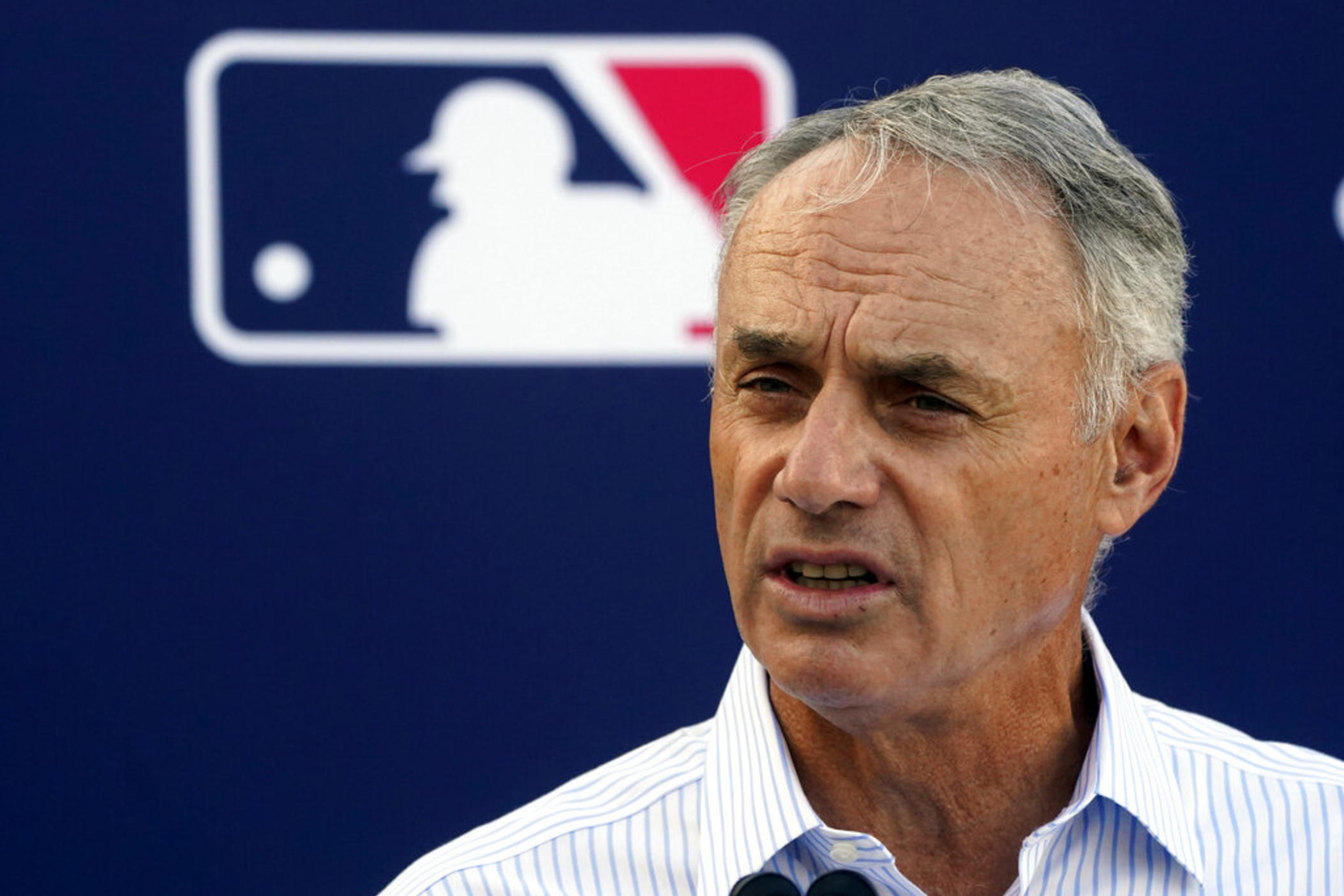 Major League Baseball Commissioner Rob Manfred speaks during a news conference after negotiations with the players' association toward a labor deal, Tuesday, March 1, 2022, at Roger Dean Stadium in Jupiter, Fla. Manfred said he is canceling the first two series of the season that was set to begin March 31, dropping the schedule from 162 games to likely 156 games at most. Manfred said the league and union have not made plans for future negotiations. Players won't be paid for missed games. 