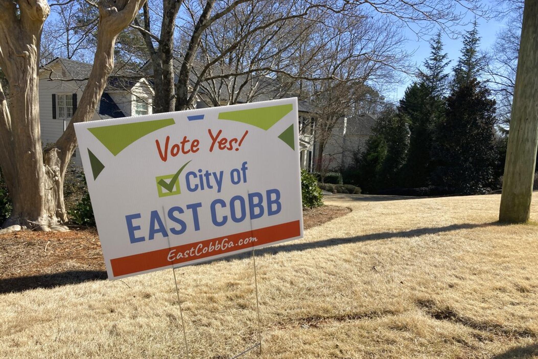 A sign in the ground outside a home in Cobb County on Feb. 14, 2022 encourages residents to vote in favor of creating the city of East Cobb. It's one of three cityhood referendums coming up in May in Cobb County that follow the election of three Black women to the county commission in the 2020 election, giving Democrats a majority on the commission for the first time in decades.