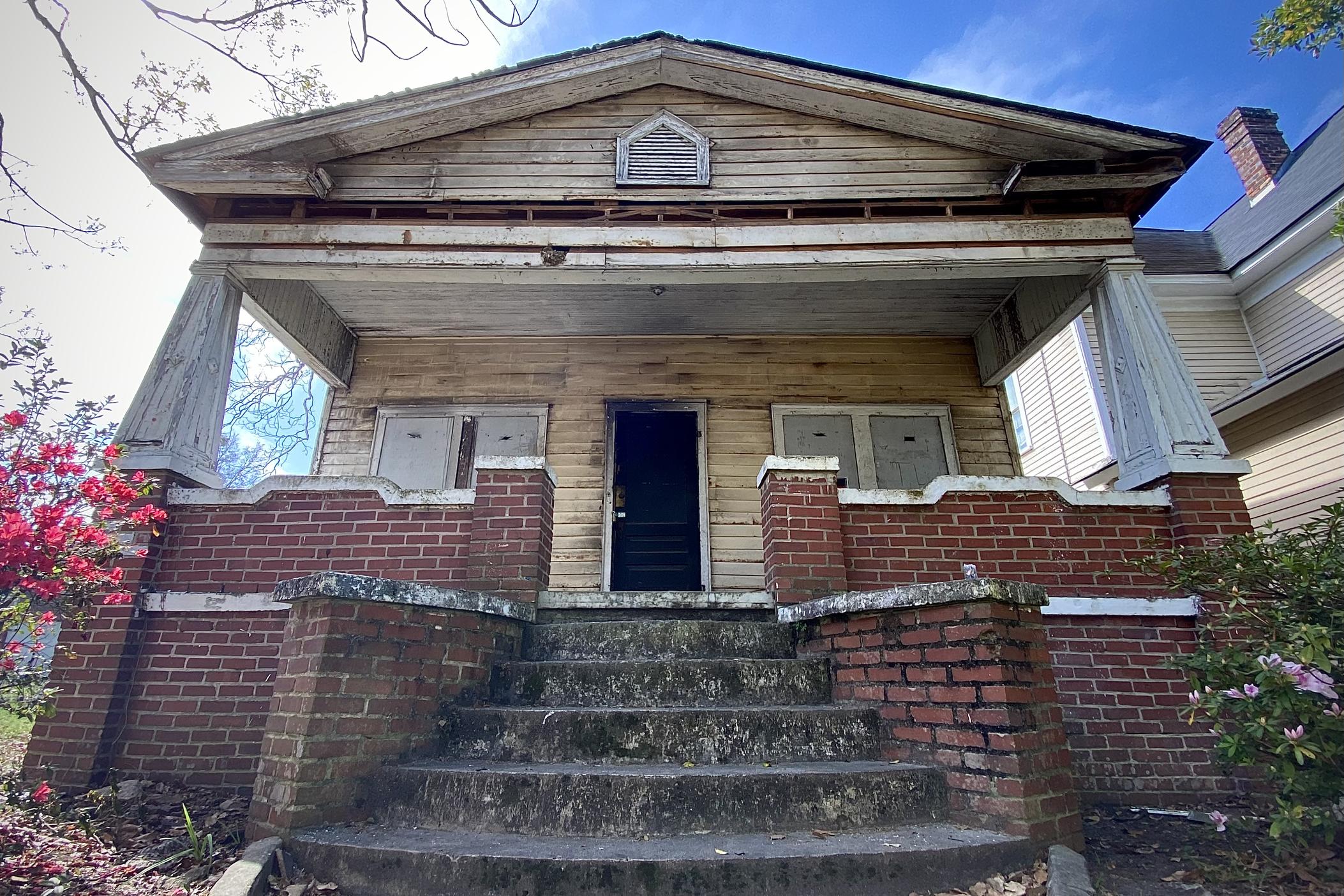This house in the Cuyler-Brownville neighborhood of Savannah is undergoing extensive renovation, as part of a new effort to combat rising home prices through the use of historic preservation.