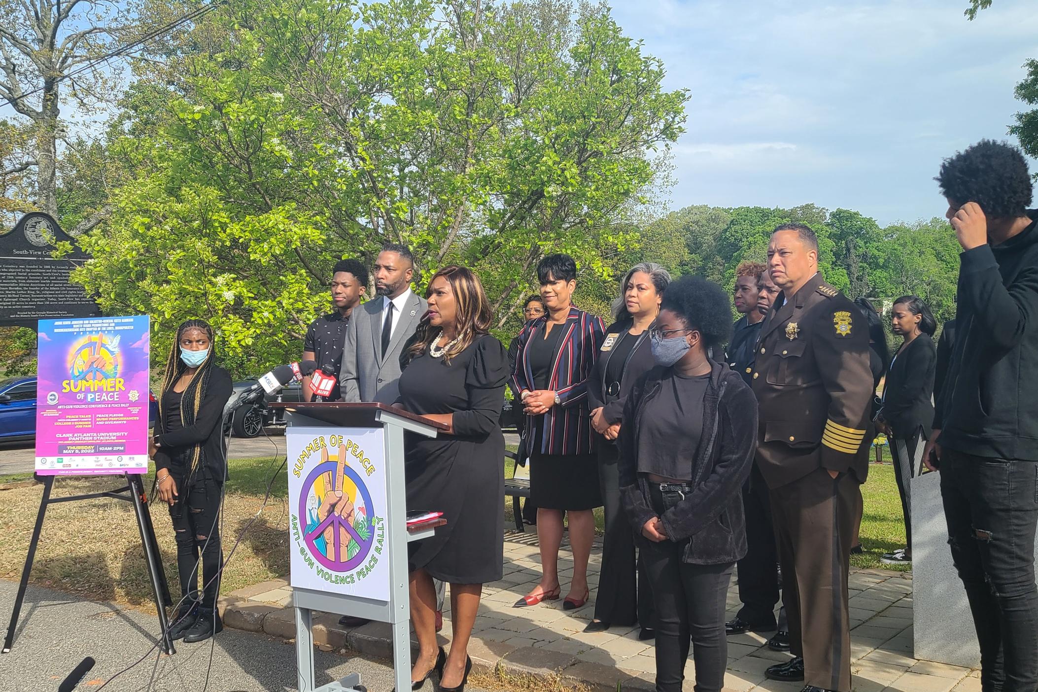 Fulton County Probate Judge Kenya Johnson speaks at Southview Cemetery about a new anti gun violence initiative for Atlanta's youth.