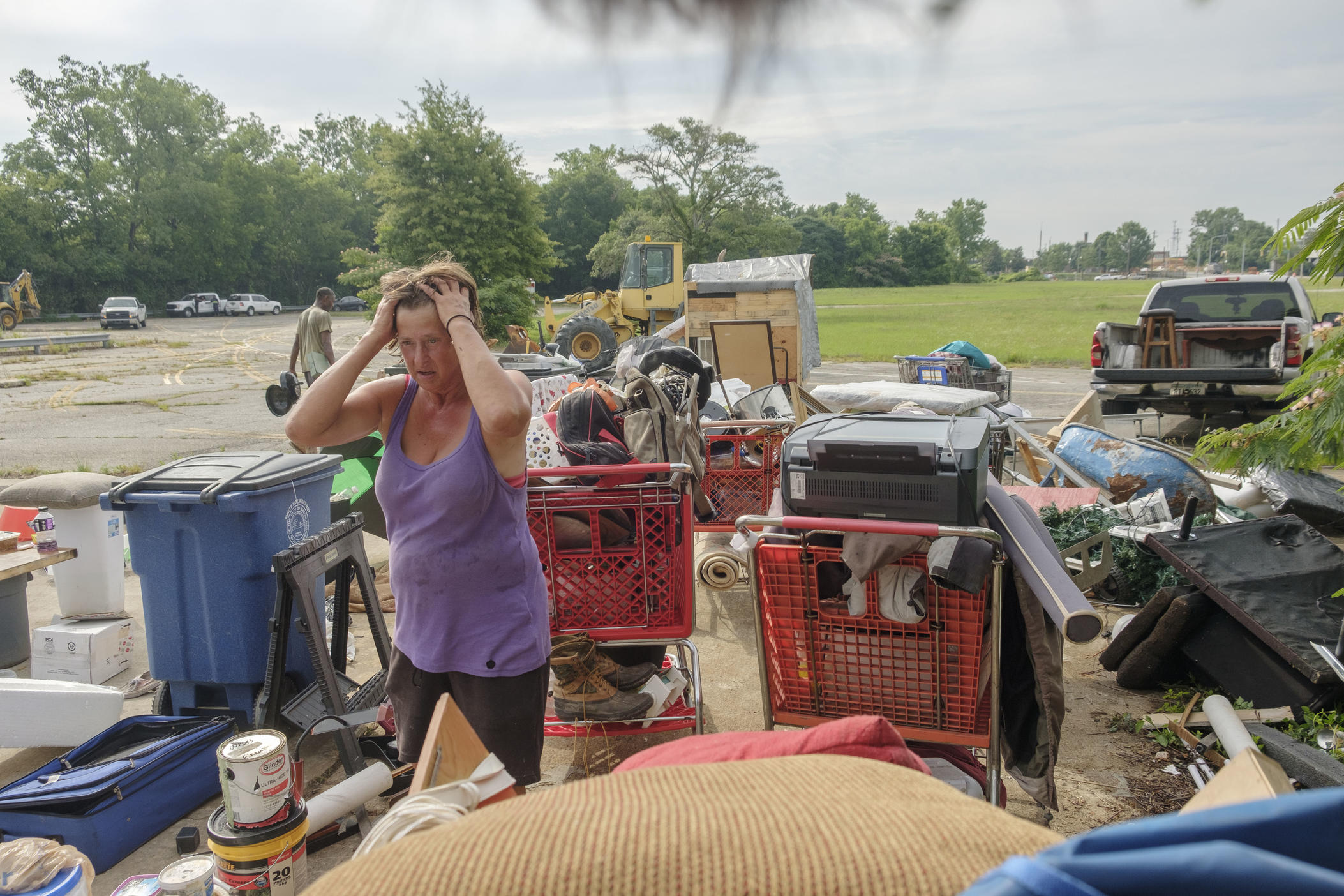 Pat Garrett pauses while packing up her belongings at the edge of a homeless encampment on Riverside Drive in Macon on June 8, 2022. Macon-Bibb County bulldozed one of the city's largest homeless encampments, saying it was necessary as a public health measure.