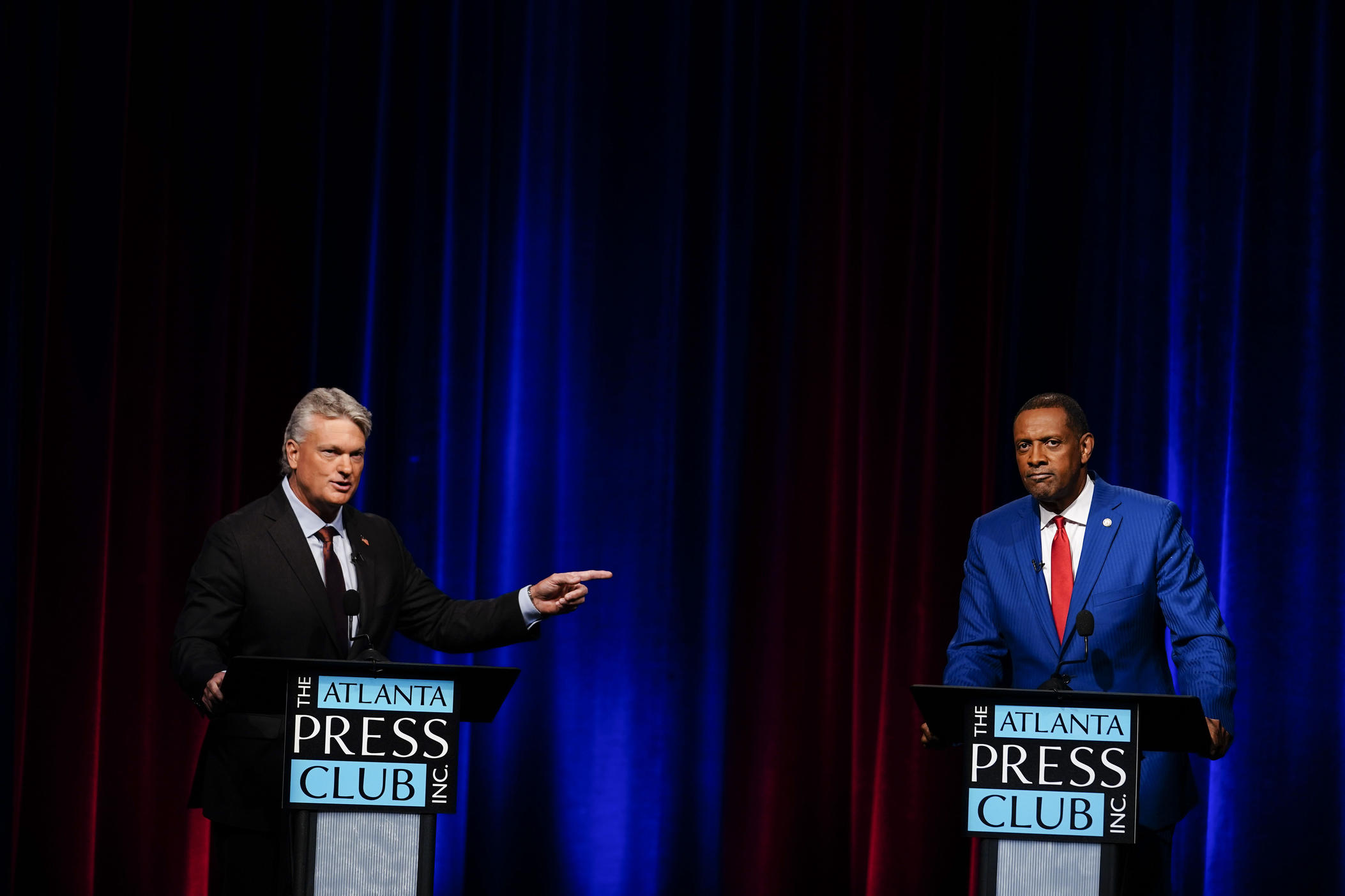 Mike Collins, left, and Vernon Jones participate in Georgia's 10th Congressional District republican primary election runoff debates on Monday, June 6, 2022, in Atlanta.