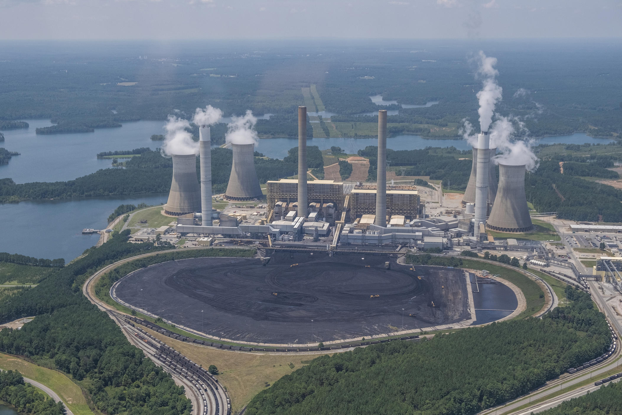 Front end loaders are dwarfed by the coal field at Georgia Power's Plant Scherer.