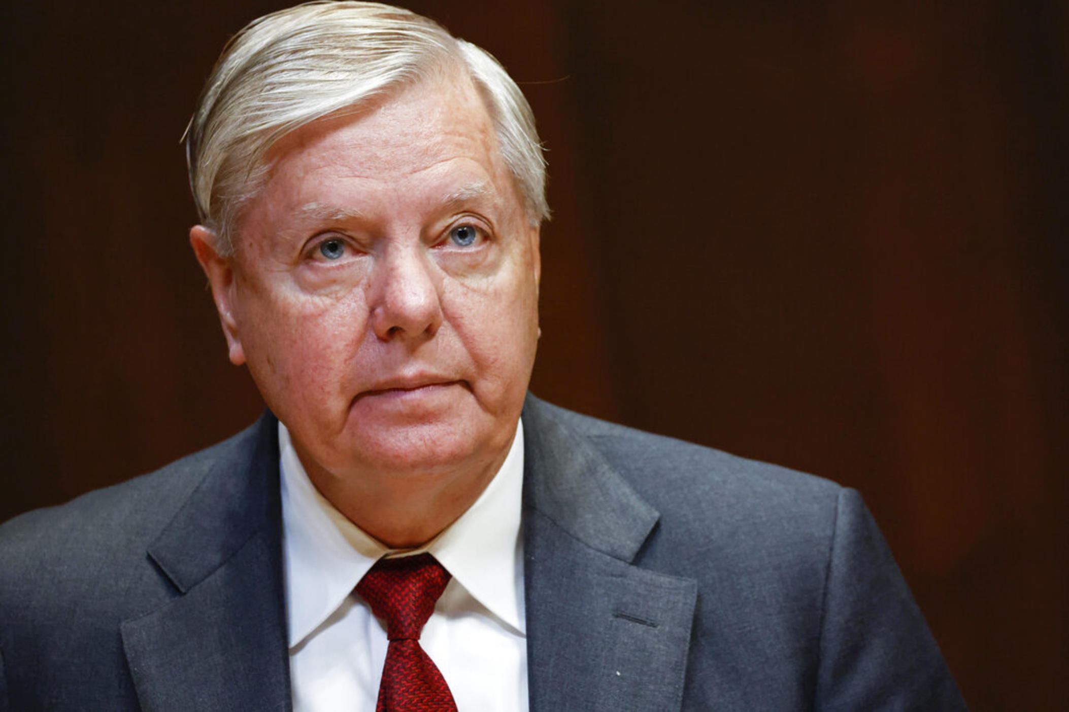 Sen. Lindsey Graham, R-S.C., listens during a hearing on the fiscal year 2023 budget for the FBI in Washington, on May 25, 2022. Attorneys for Graham said in a court filing on July 13, he wasn't trying to interfere in Georgia's 2020 election when he called state officials to ask them to reexamine certain absentee ballots after President Donald Trump's narrow loss to Democrat Joe Biden.