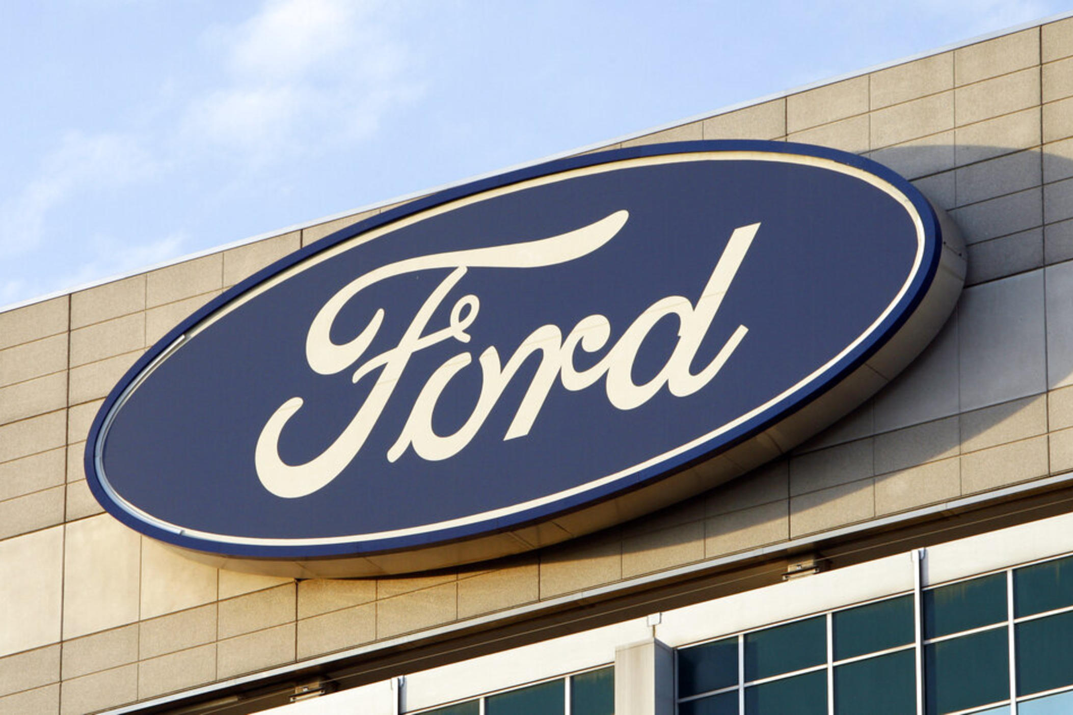 In this Oct. 26, 2009 photo, the Ford logo is seen on the automaker's headquarters in Dearborn, Mich. A Georgia jury has returned a $1.7 billion verdict against Ford Motor Co. involving a pickup truck crash that claimed the lives of a Georgia couple. 
