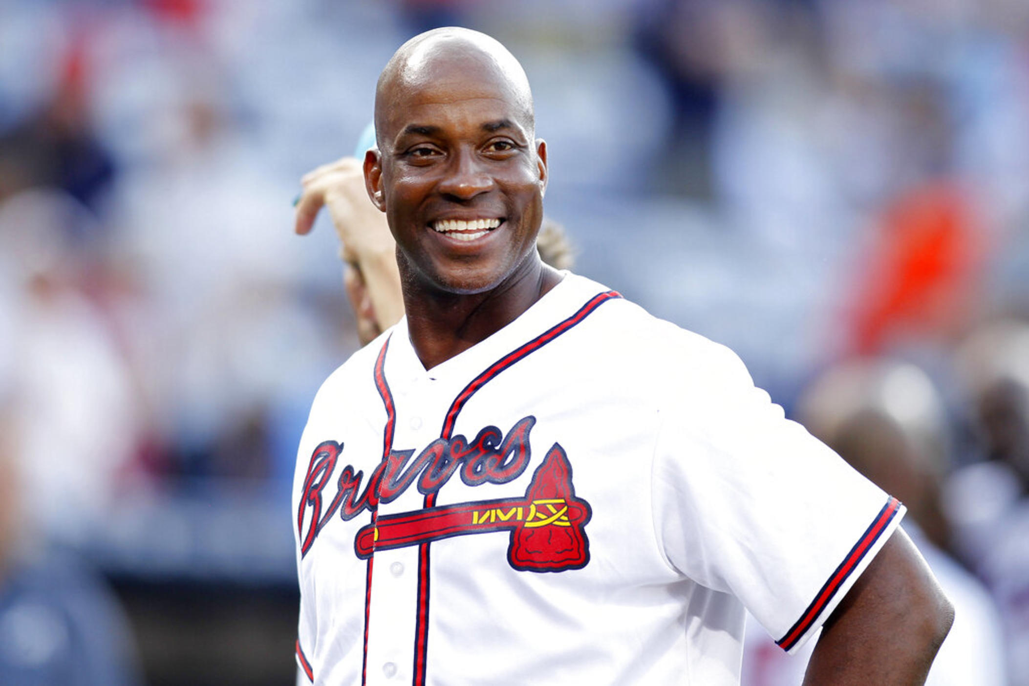 Former Atlanta Braves first baseman Fred McGriff smiles on the field before a baseball game against the Miami Marlins, Friday, Aug. 7, 2015, in Atlanta. Barry Bonds, Roger Clemens and Curt Schilling were passed over by a Baseball Hall of Fame committee that elected former big league slugger Fred McGriff to Cooperstown on Sunday, Dec. 4, 2022.
