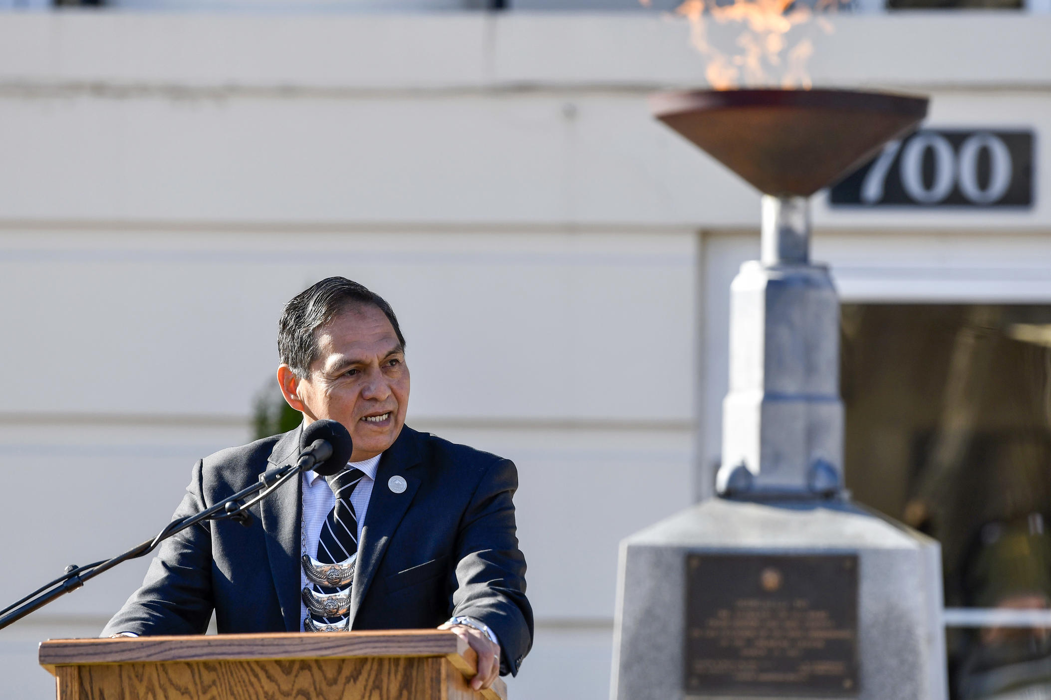 Principal Chief of the Muscogee Nation David Hill speaks in front of Macon City Hall Friday. 