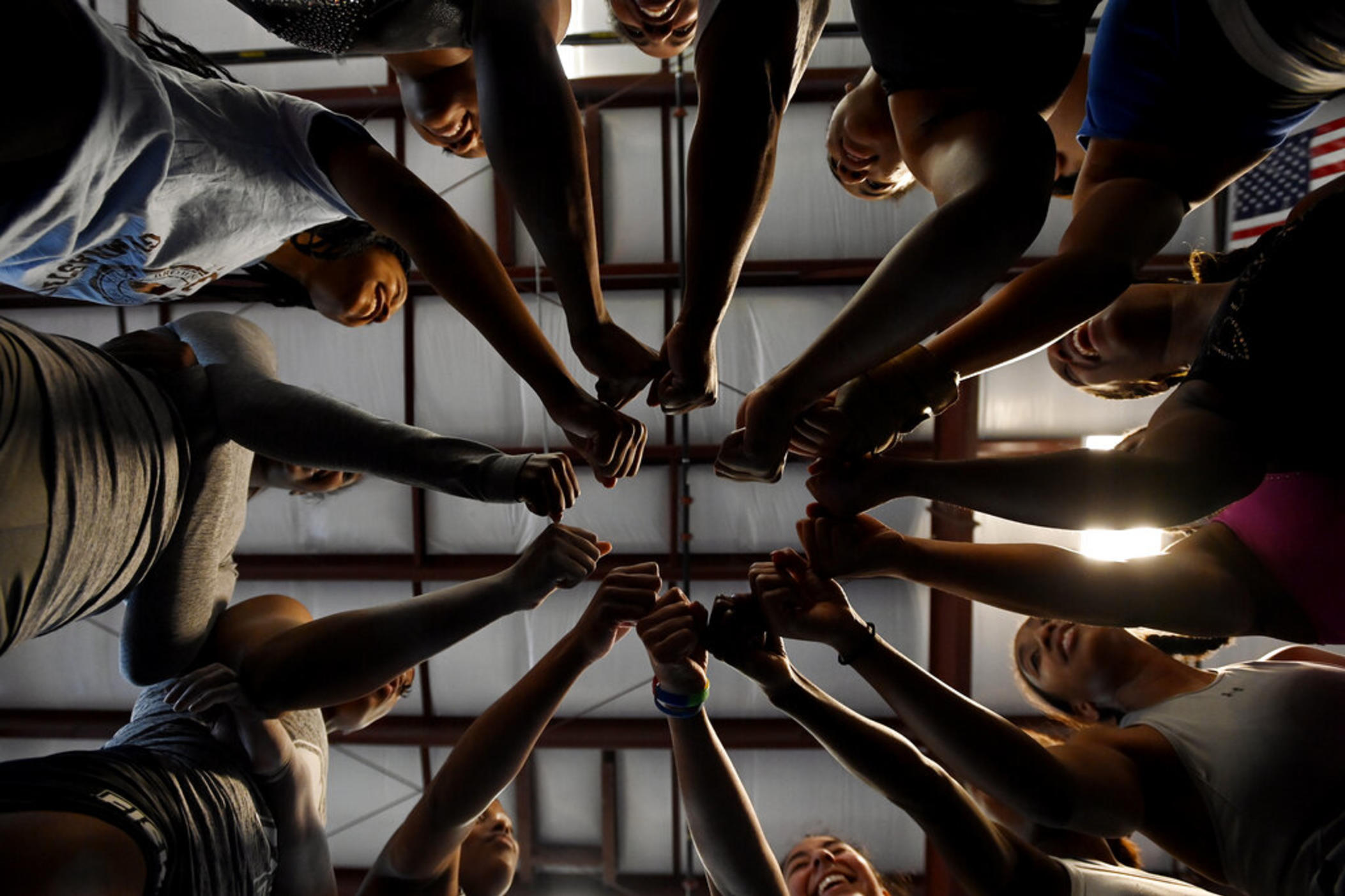 Fisk University gymnastics team gathers in a circle for a cheer during practice at the Nashville Gymnastics Training Center on Wednesday, Dec. 28, 2022, in Nashville, Tenn. On Friday afternoon, Jan. 6, 2023, at Orleans Arena in Las Vegas, Fisk University will make history when they become the first HBCU to participate in an NCAA women's gymnastics meet.