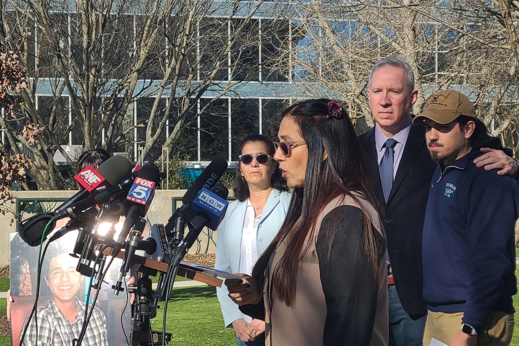  Manuel Teran’s mother speaks at a Feb. 6, 2023, press conference surrounded by family including Teran’s father and brother.