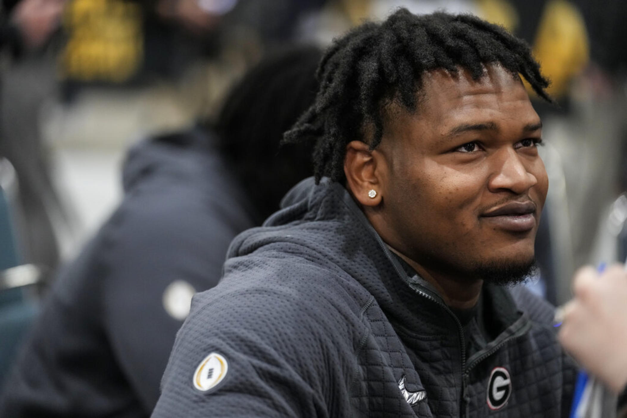  Georgia defensive lineman Jalen Carter speaks during media day ahead of the national championship NCAA College Football Playoff game between Georgia and TCU, Saturday, Jan. 7, 2023, in Los Angeles. Carter, projected as one of the top players in next month's NFL draft, has been charged with reckless driving and racing in conjunction with the crash that killed offensive lineman Devin Willock and a recruiting staff member. 