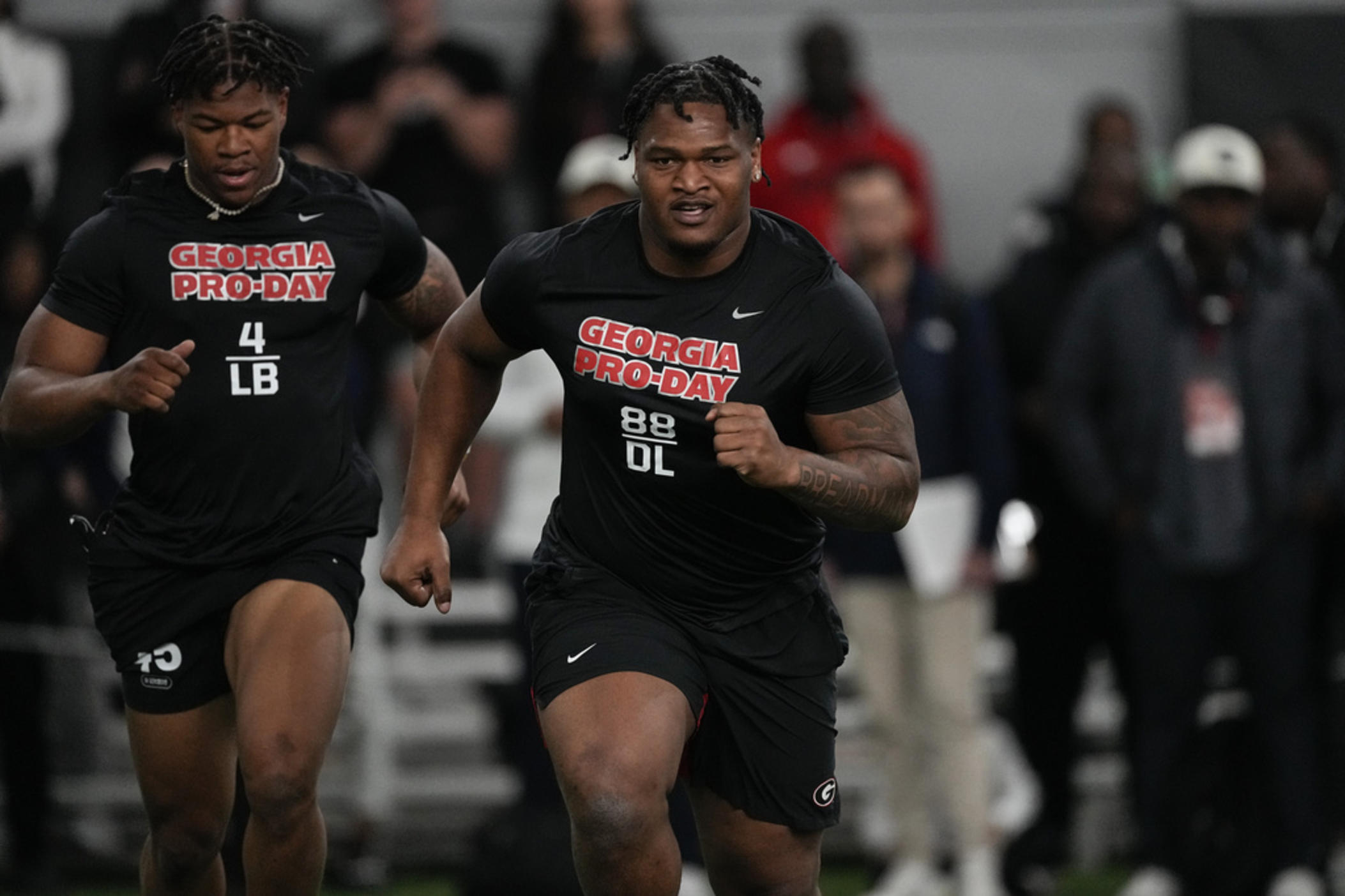 Georgia defensive lineman Jalen Carter runs football drills during Georgia's Pro Day, Wednesday, March 15, 2023, in Athens, Ga. 