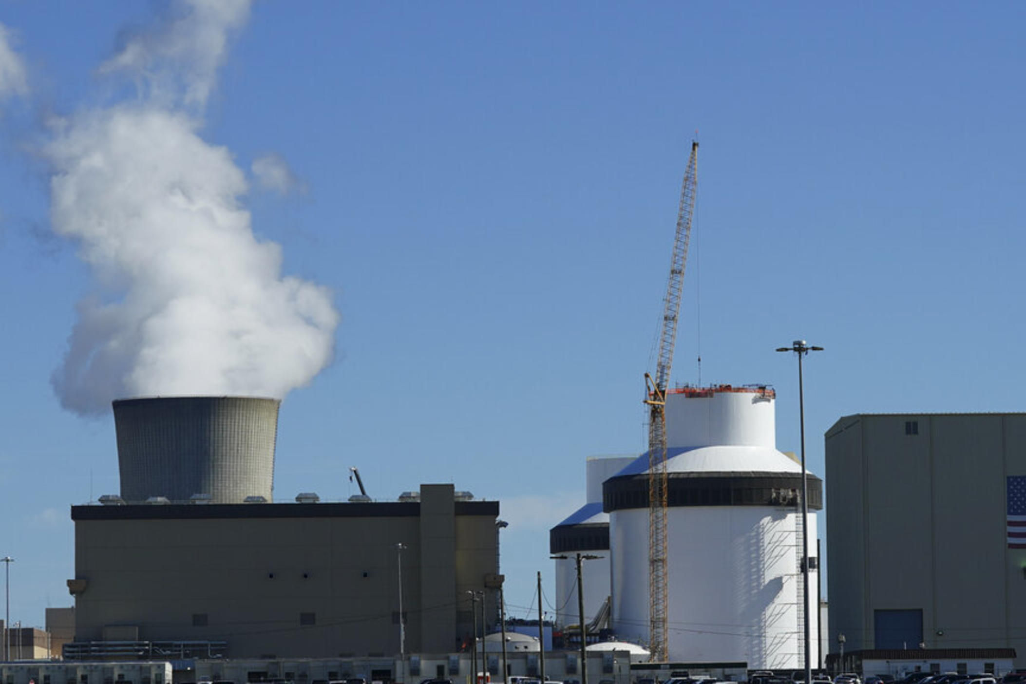 Reactor number 3 and it's cooling tower stands at Georgia Power Co.'s Plant Vogtle nuclear power plant on Jan. 20, 2023, in Waynesboro, Ga. The nuclear plant has begun splitting atoms in one of its two new reactors, Georgia Power Co. said Monday, March 6, 2023, a key step toward reaching commercial operation at the first new nuclear reactors built from scratch in decades in the United States.