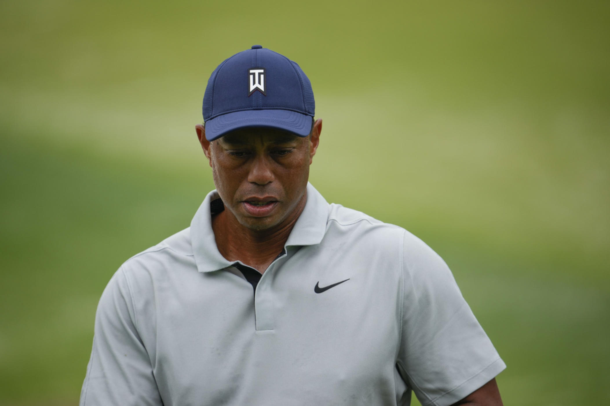 Tiger Woods works out on the range during a practice for the Masters golf tournament at Augusta National Golf Club, Tuesday, April 4, 2023, in Augusta, Ga. 