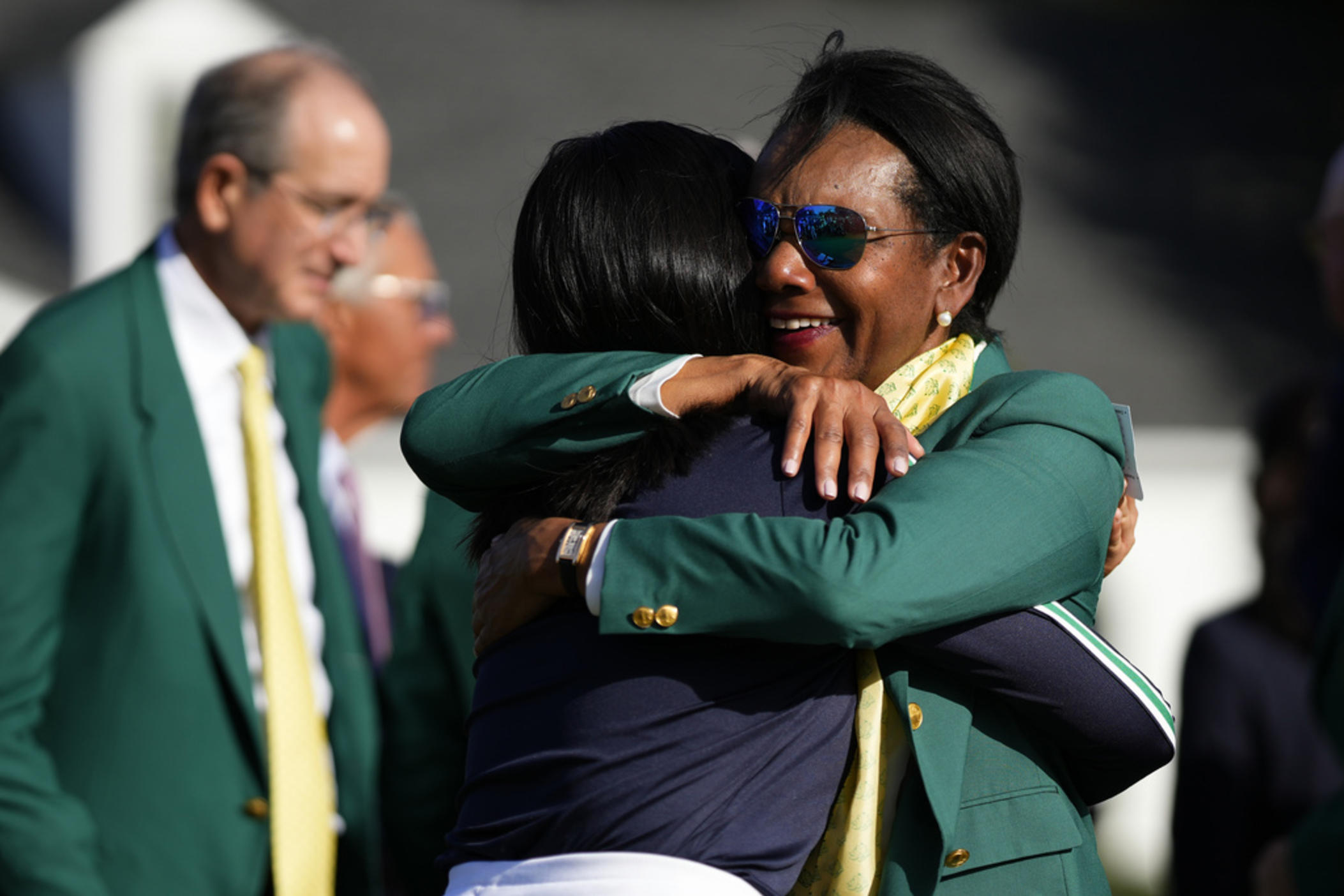 In this April, 1, 2023 photo, former Secretary of State Condoleezza Rice, right, hugs Rose Zhang after Zhang won the Augusta National Women's Amateur golf tournament in Augusta, Ga.