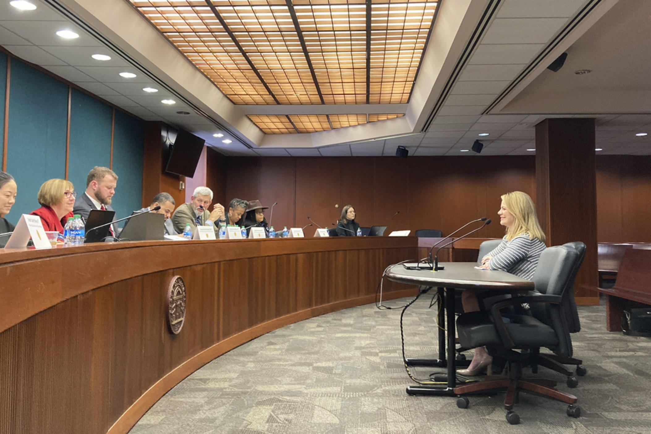 Georgia Human Services Commissioner Candice Broce, right, testifies in favor of a bill that would slow the flow of children into foster care on Feb. 16, 2023, at the Capitol in Atlanta. Broce has said that the insurer managing care for Georgia's foster children is denying too many requests for mental health care. 