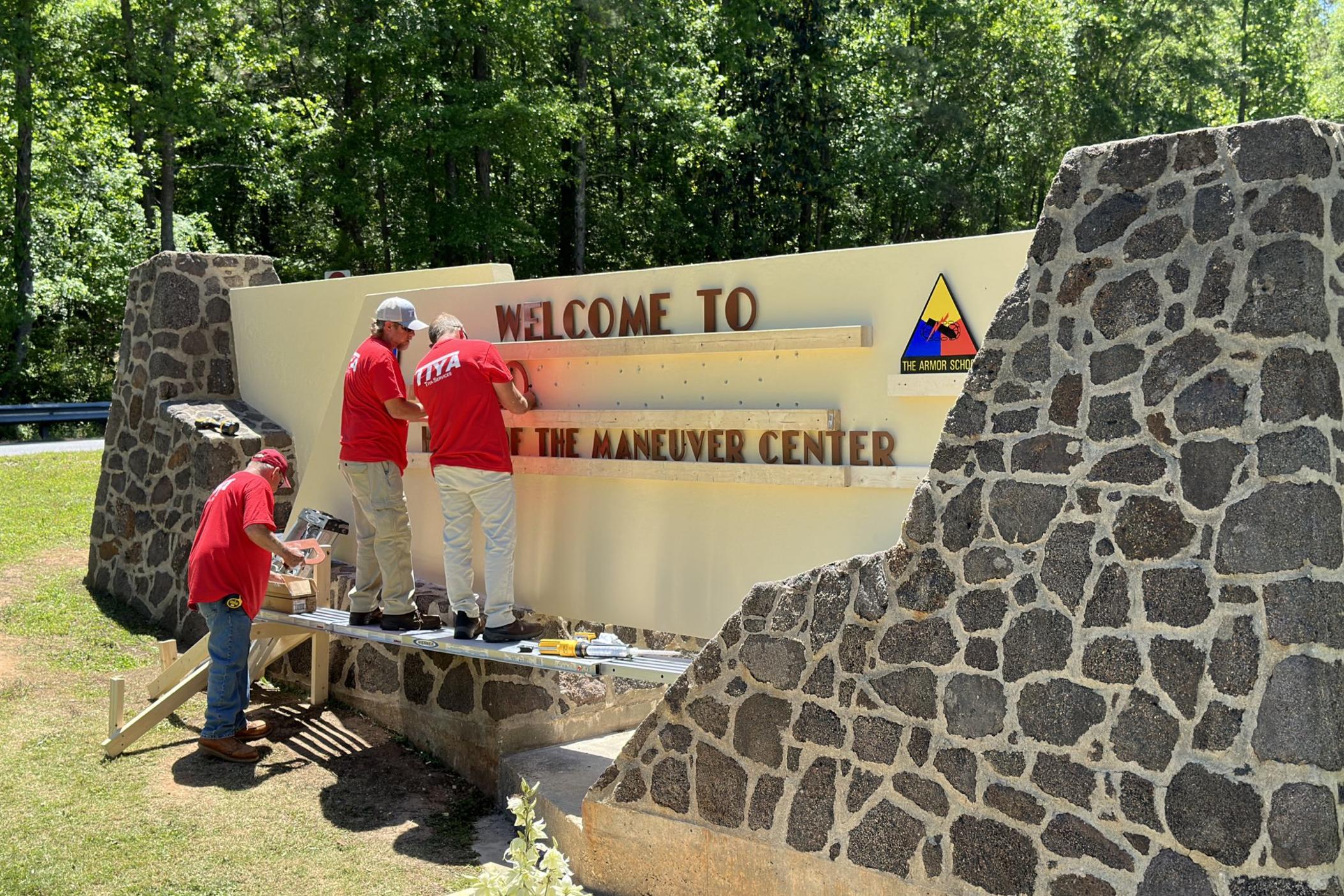 The sign on the stone gate of the Army's training hub in Georgia is changed from ⁦Fort Benning ⁩to Fort Moore in honor of Lt. Gen. Hal Moore and his wife, Julia.