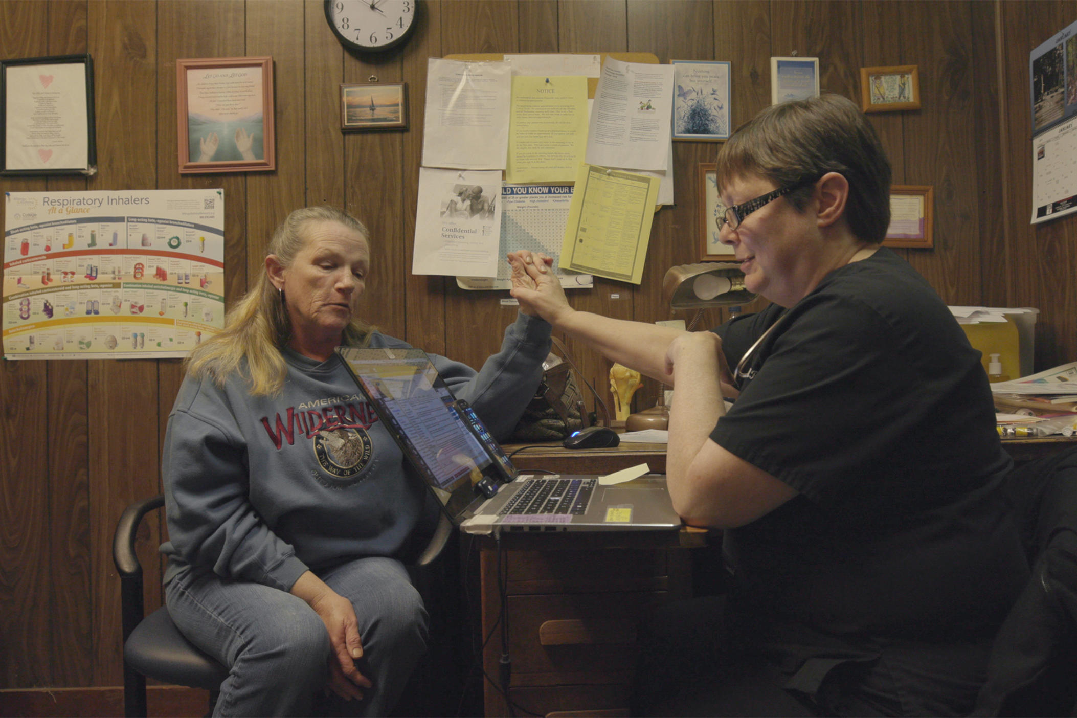 Dr. Karen Kinsell working with a patient
