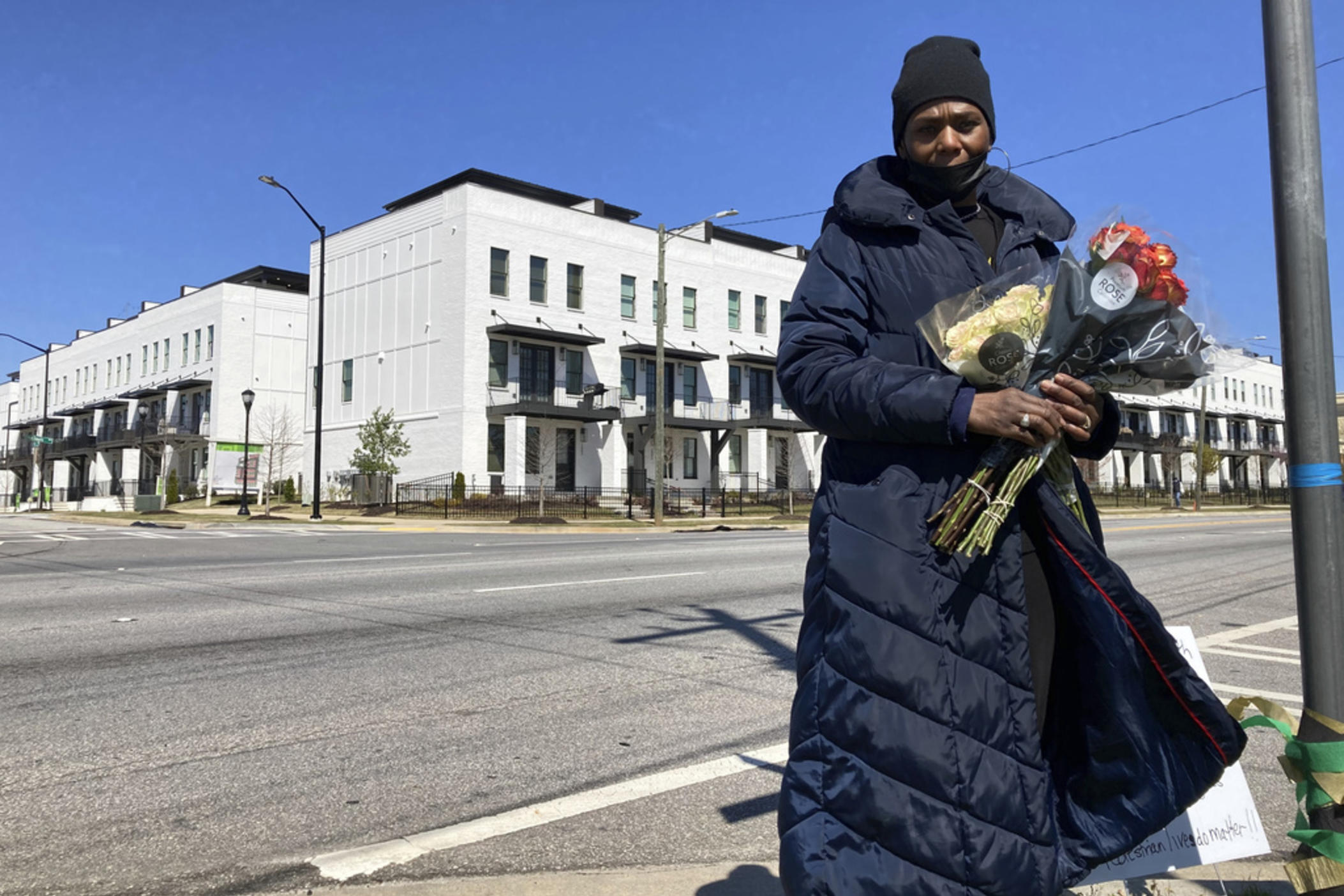 Valerie Handy-Carey stands at Donald Lee Hollowell Parkway and Finley Avenue on March 19, 2023, in Atlanta. Several months earlier, her daughter Brittany Glover was hit by a car and died while trying to cross the intersection. With pedestrian deaths in the U.S. at their highest in four decades, citizens across the nation are urging lawmakers to break from transportation spending focused on car culture. Atlanta, she said, needs to do more to protect pedestrians and cyclists.