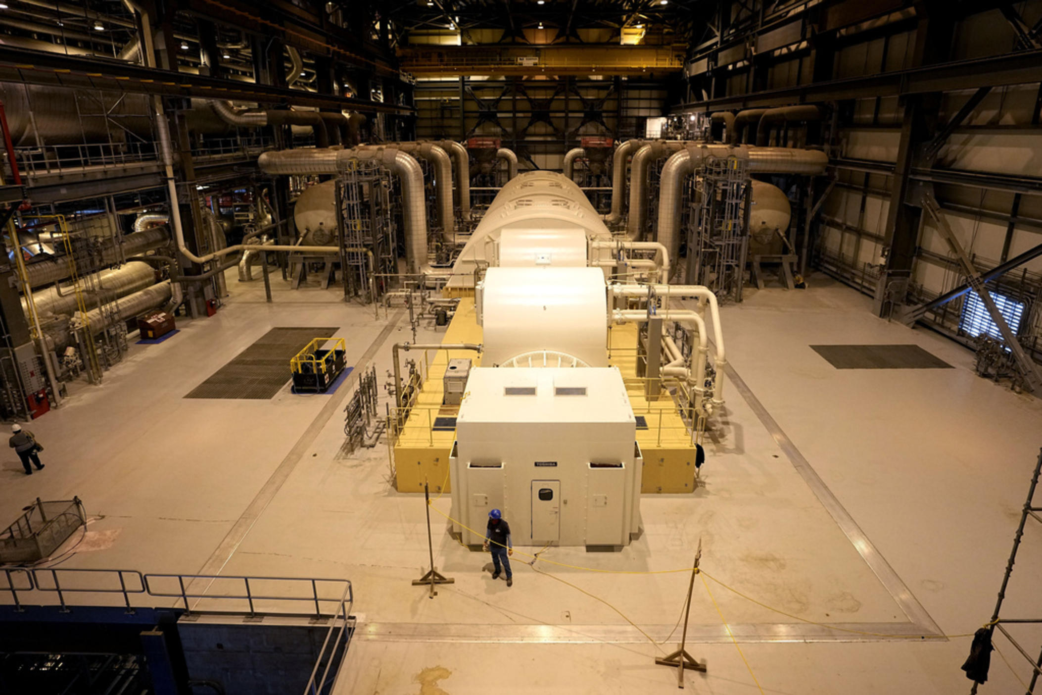 A turbine that generates electricity using steam heated by nuclear fission sits at Georgia Power Co.'s Plant Vogtle nuclear power plant Jan. 20, 2023, in Waynesboro, Ga. Company officials announced Friday, June 16, 2023, that the turbine's hydrogen cooling system had a problem with its seal, pushing back the commercial operation date of Unit 3, one of two new reactors at the site, to July. 