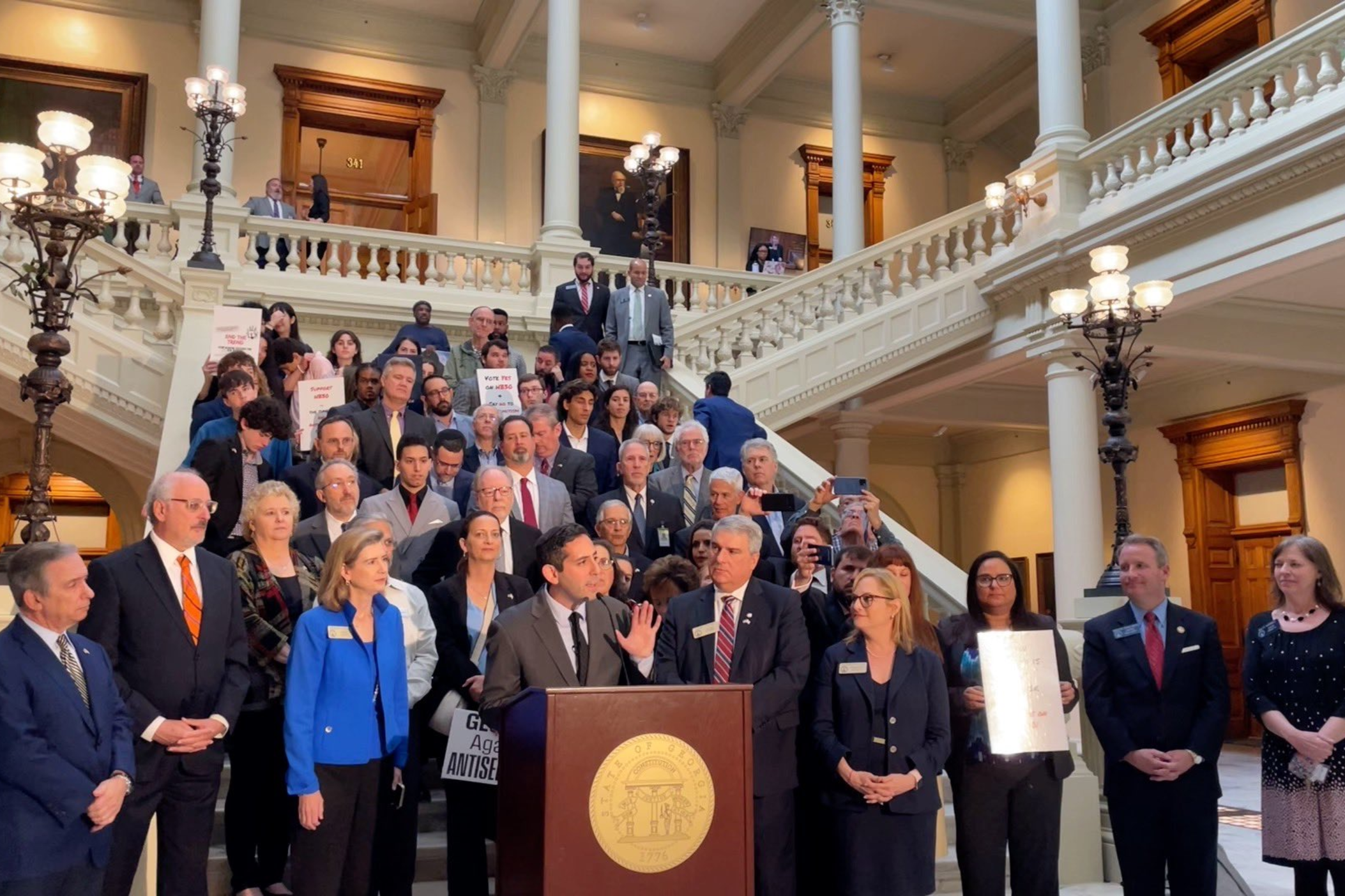 Rep. John Carson (to right of podium) gathers with members of the Georgia legislature inside the capitol on February 22, 2023 to support House Bill 30, known as the 'Antisemitism Bill.'