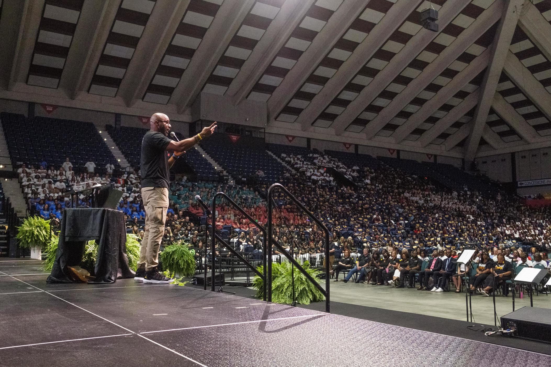 Bibb Schools Superintendent Dan Sims speaks during the district convocation ceremony Tuesday. Sims called teachers to work together even across school buildings as they head back to the classroom. 