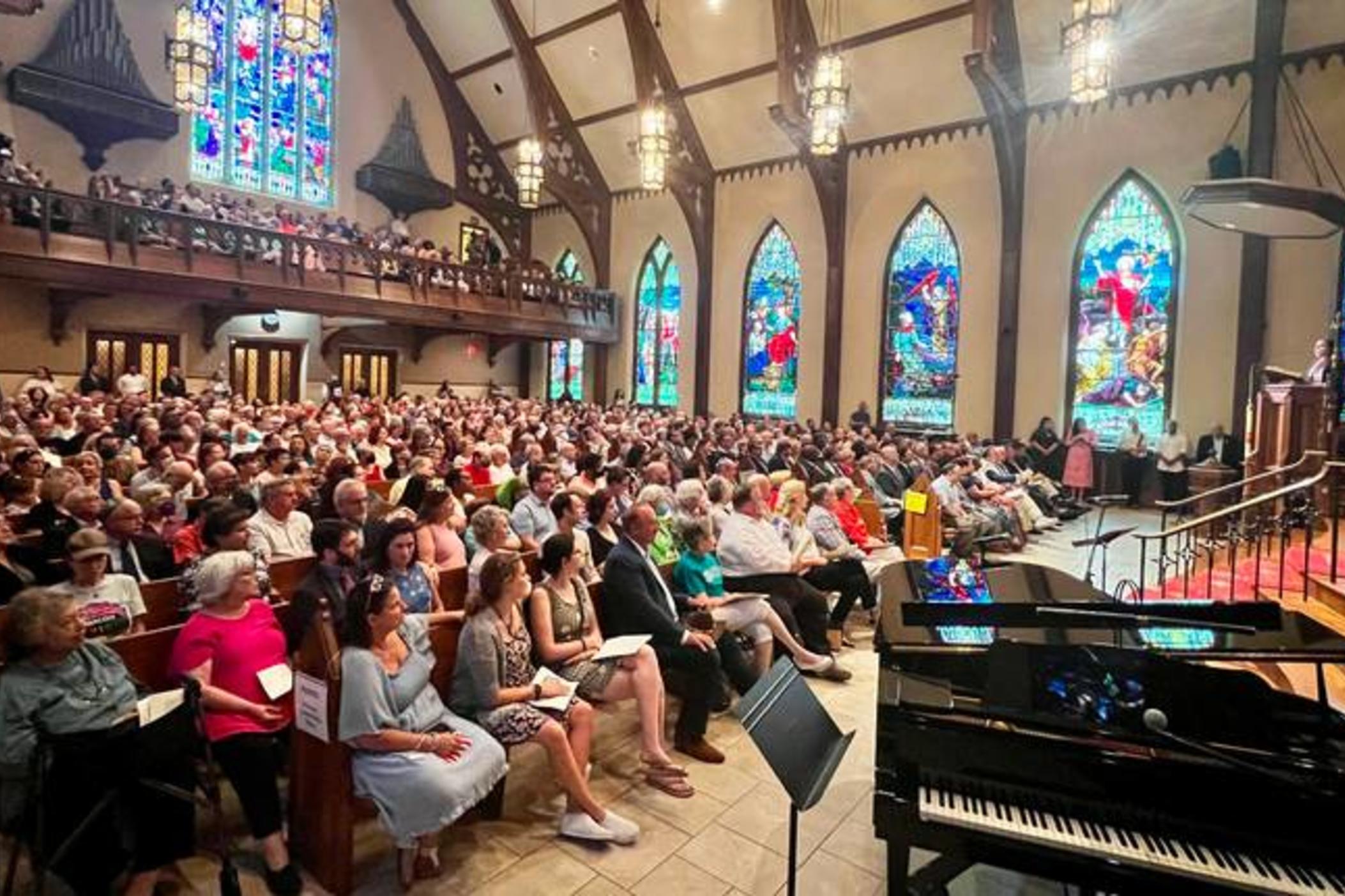 Rabbi Elizabeth Bahar with Temple Beth Israel speaks Sunday during “A Service for Unity and Love” at Mulberry Street United Methodist Church. The event was put together after an antisemitic group gathered outside the synagogue last week. 