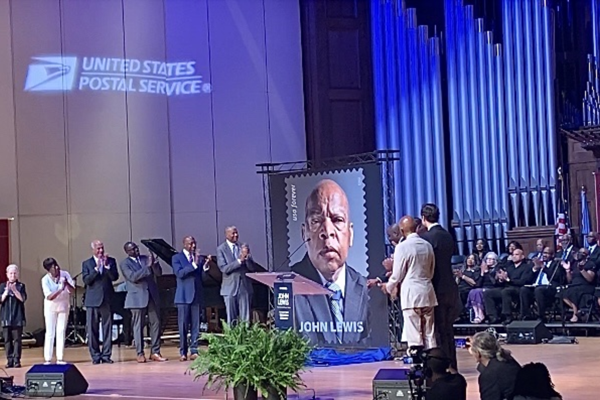 The John Lewis 'forever' stamp is unveiled at Morehouse College in Atlanta on July 21, 2023 at an event hosted by the U.S. Postal Service.