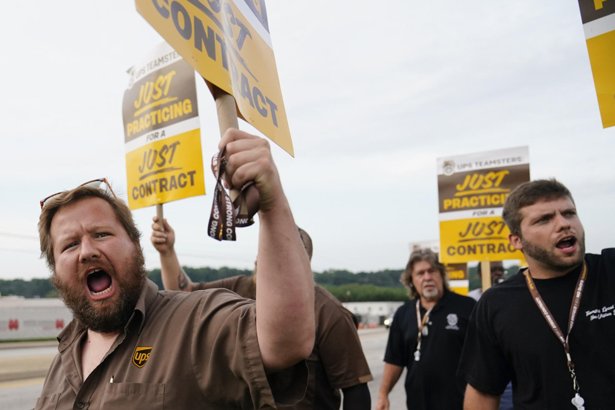 UPS teamsters and workers hold a rally, Friday, July 21, 2023, in Atlanta, as a national strike deadline nears. The Teamsters said Friday that they will resume contract negotiations with UPS, marking an end to a stalemate that began two weeks ago when both sides walked away from talks while blaming each other. 