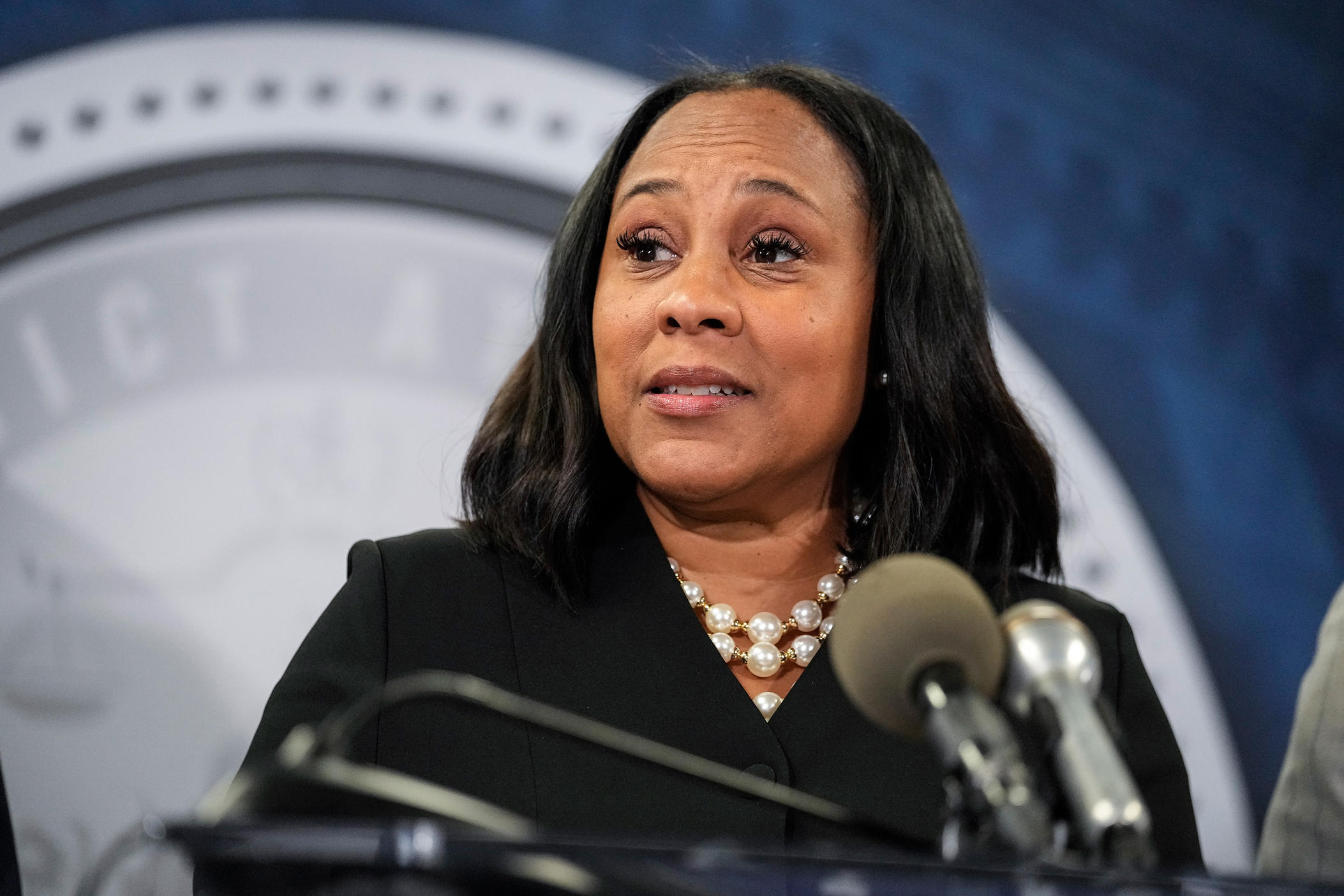 Fulton County District Attorney Fani Willis speaks in the Fulton County Government Center during a news conference, Monday, Aug. 14, 2023, in Atlanta. Donald Trump and several allies have been indicted in Georgia over efforts to overturn his 2020 election loss in the state.