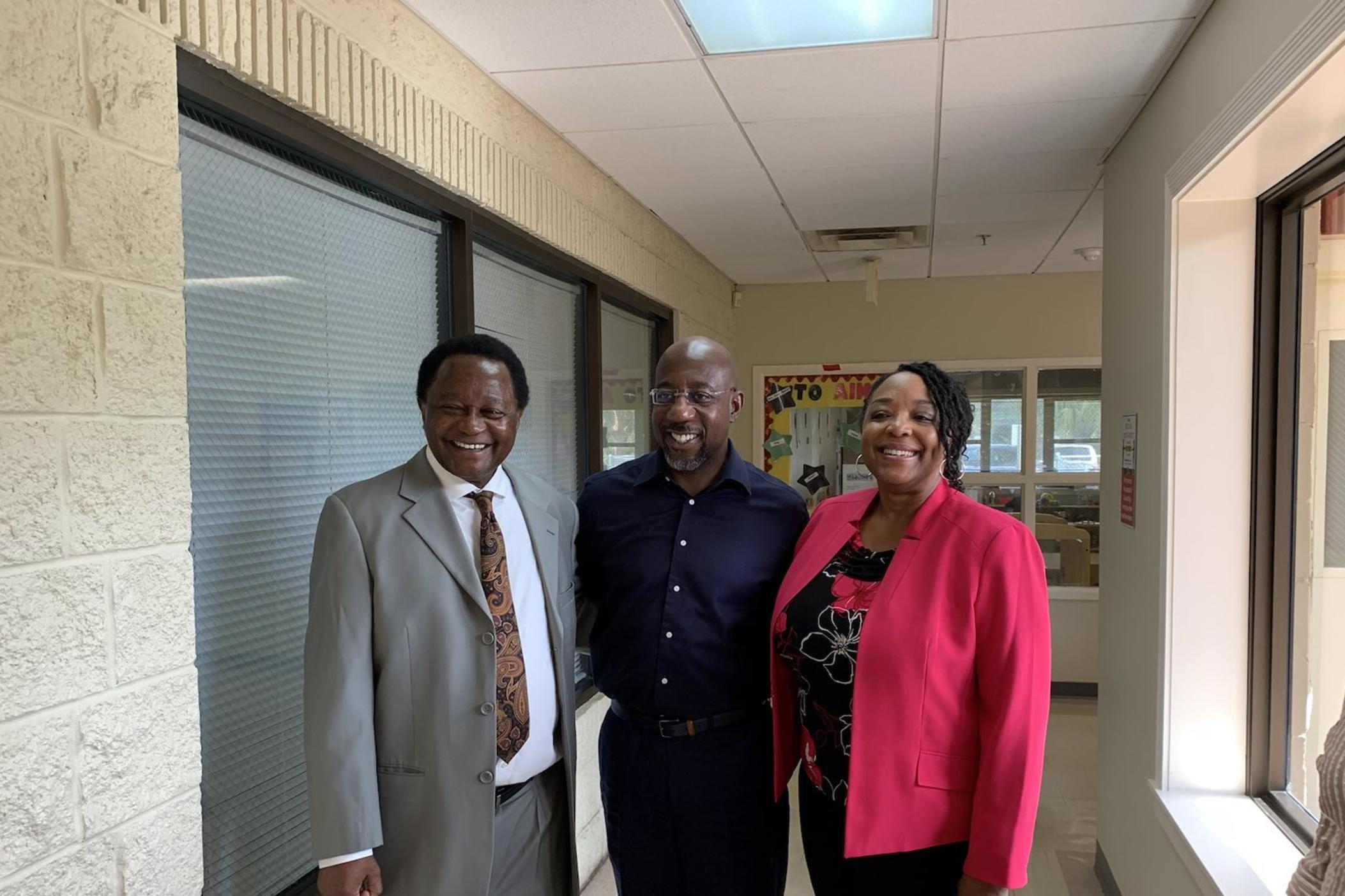 Sen. Warnock pictured with Savannah Head Start Program leaders.