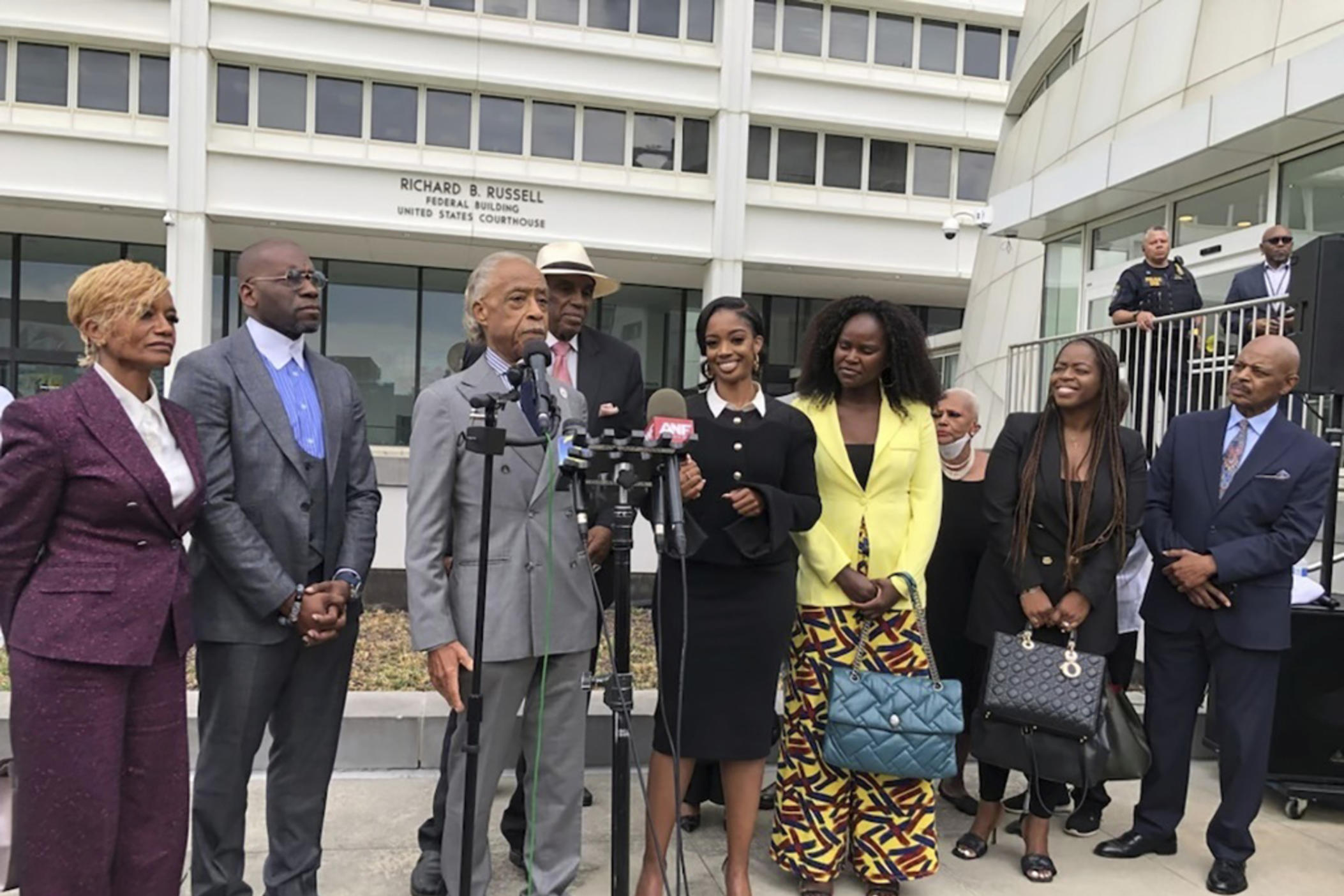 The Rev. Al Sharpton speaks outside the Richard B. Russell federal courthouse in Atlanta, on Tuesday, Sept. 26, 2023. To his left in the black dress is Fearless Fund CEO and co-founder Arian Simone. A judge Tuesday refused to block a grant program the fund administers for Black women entrepreneurs, saying a lawsuit arguing it illegally excluded other races was not likely to succeed. 