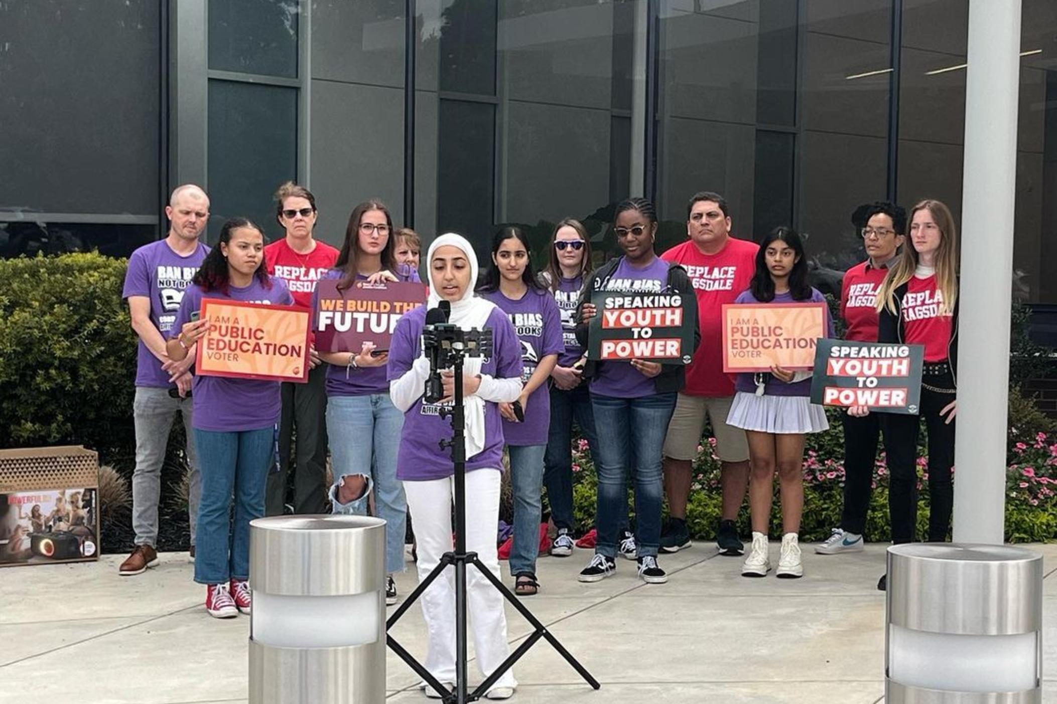 Georgia Youth Justice Coalition representative Haya Fatmi speaks at a press conference before the Cobb County Board of Education meeting Sept. 15, 2023.