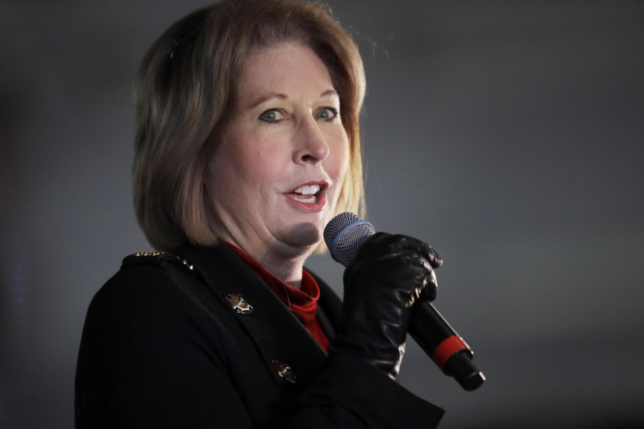 Attorney Sidney Powell, an attorney for Donald Trump, speaks during in Alpharetta, Ga., Dec. 2, 2020. A Georgia judge has ruled that former President Donald Trump and 16 others will be tried separately from two defendants who are set to go to trial next month in the case accusing them all of participating in an illegal scheme to overturn the results of the 2020 election.