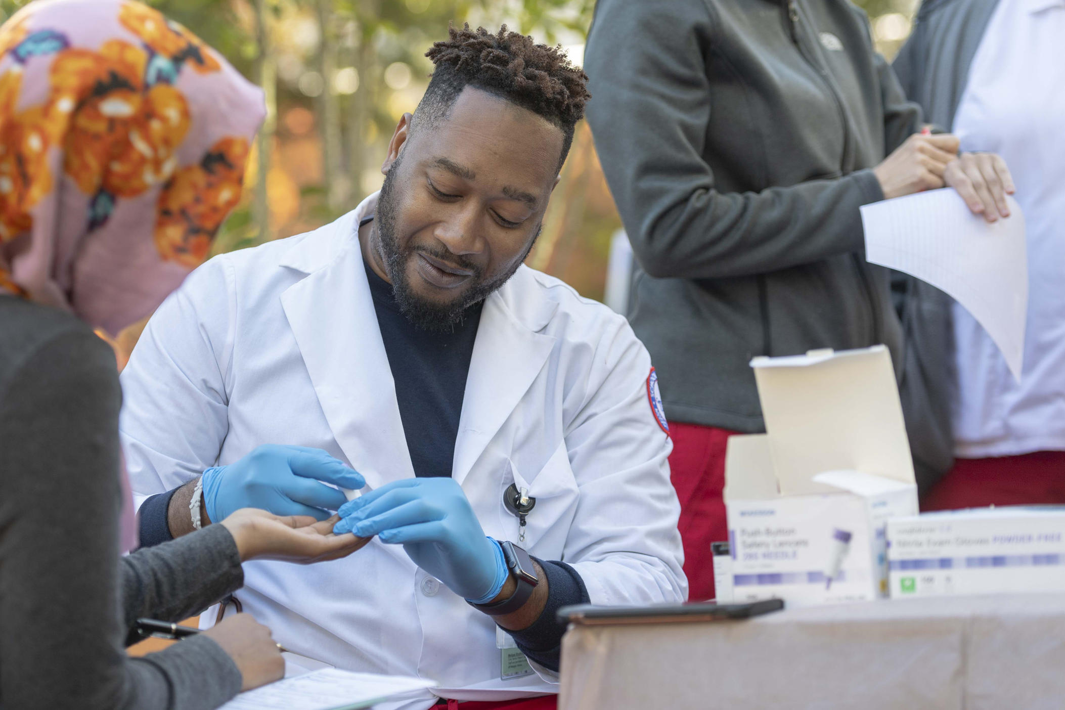 Georgia State University Perimeter College nursing students participate in a community health fair in Clarkston, GA. Community members can access free health screenings.