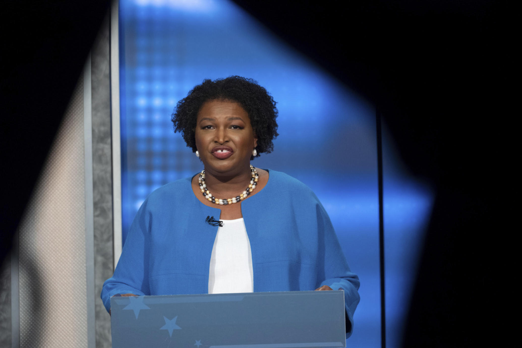Democratic challenger Stacey Abrams faces off with Republican Georgia Gov. Brian Kemp in a televised debate, Oct. 30, 2022, in Atlanta. A lawsuit that plaintiffs say could deter mass voter challenges around the country ahead of the 2024 election is headed to trial in Georgia on Thursday, Oct. 26, 2023. A group associated with Abrams accuses Texas-based True the Vote of trying to intimidate voters ahead of a 2021 Senate runoff election in Georgia.