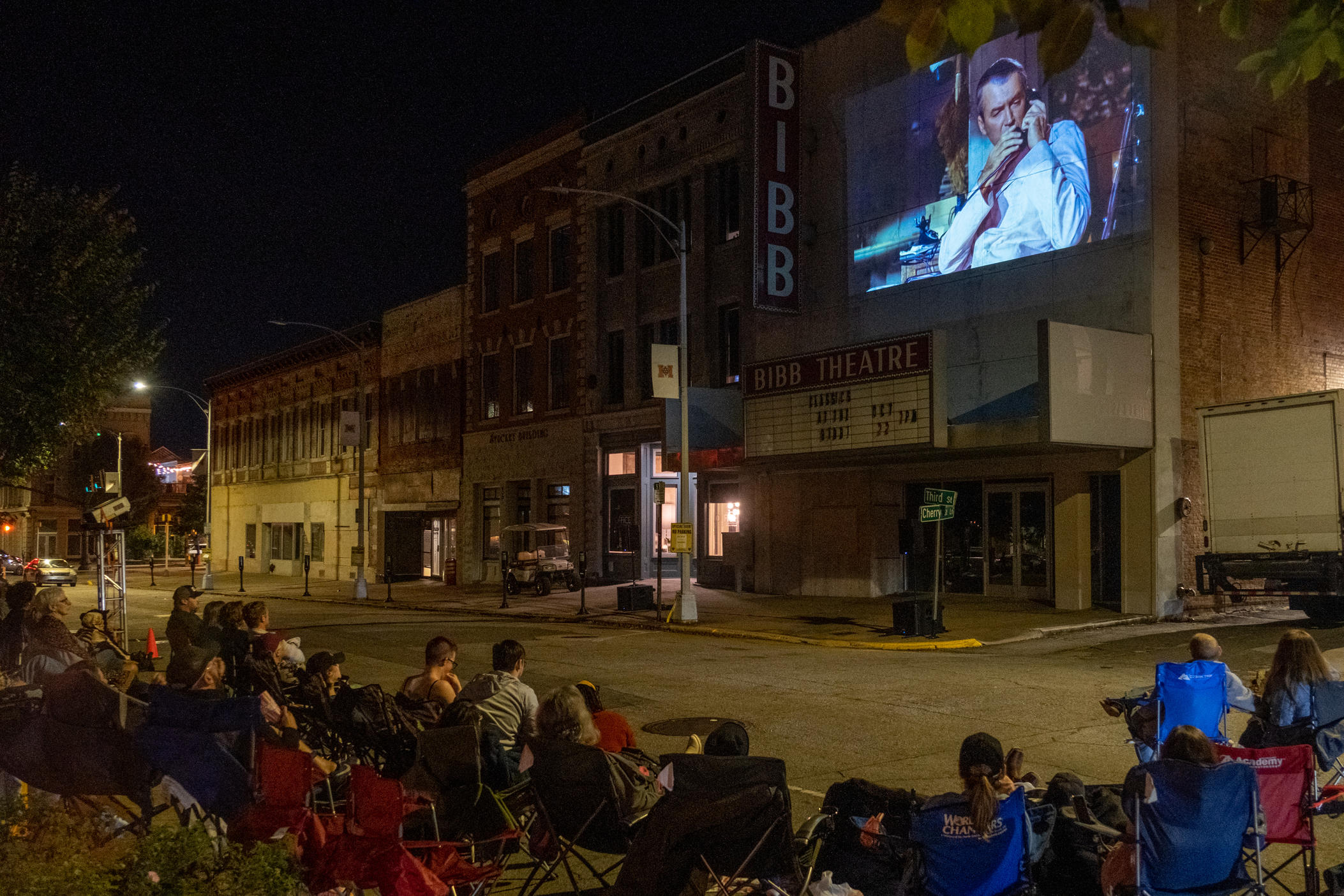 A screening of the 1954 Alfred Hitchcock film, "Rear Window", is held outside the historic Bibb Theatre in Macon on Oct. 22, 2023. It's the first in the "Classics at the Bibb" series held at the site, unused for decades.