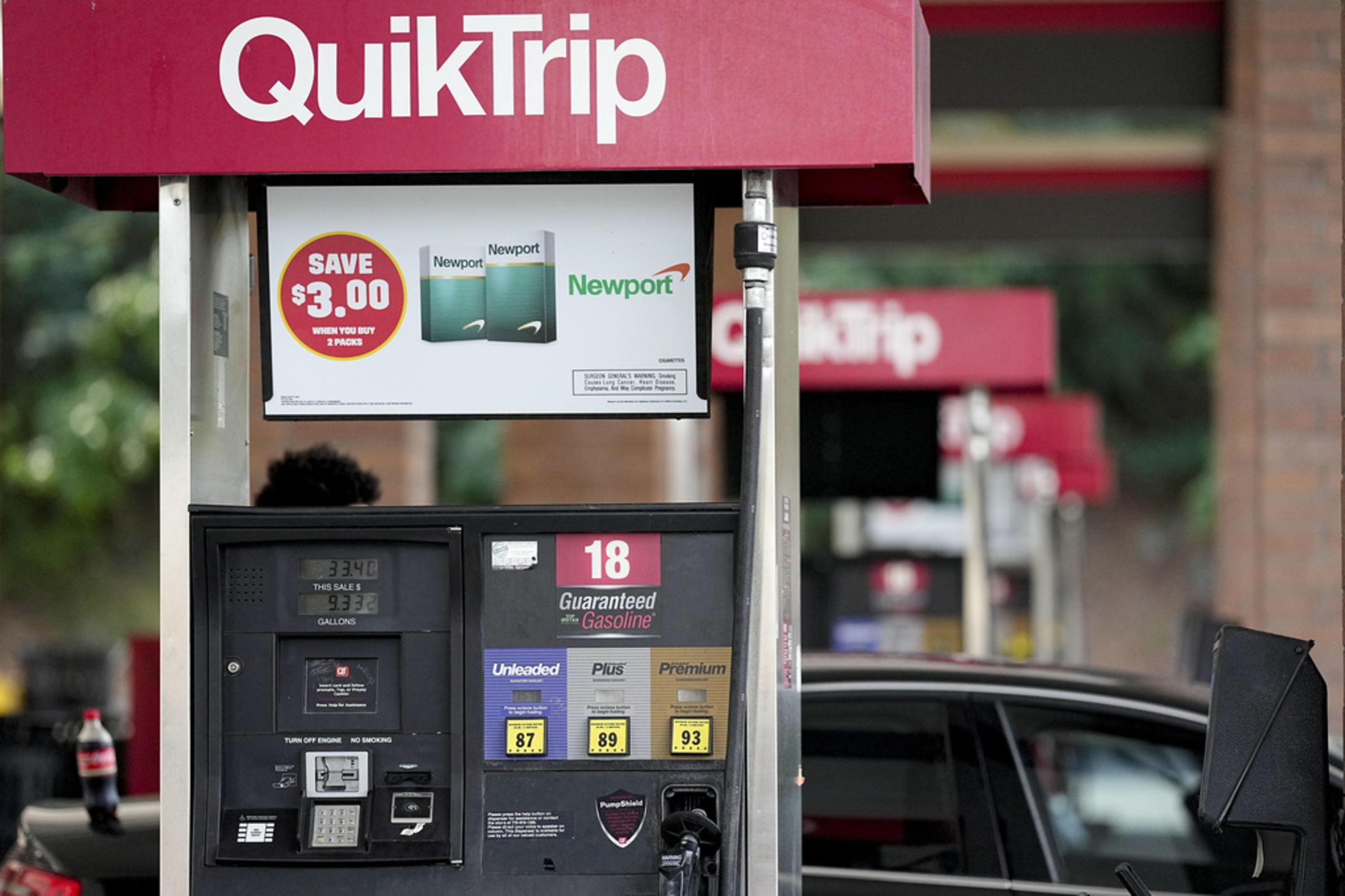 A person pumps gas on Sept. 12, 2023, in Marietta, Ga. Georgia's governor Brian Kemp on Friday, Oct. 6, 2023, continued his rollback of state taxes on gasoline and diesel fuel through Nov. 11, 2023. 